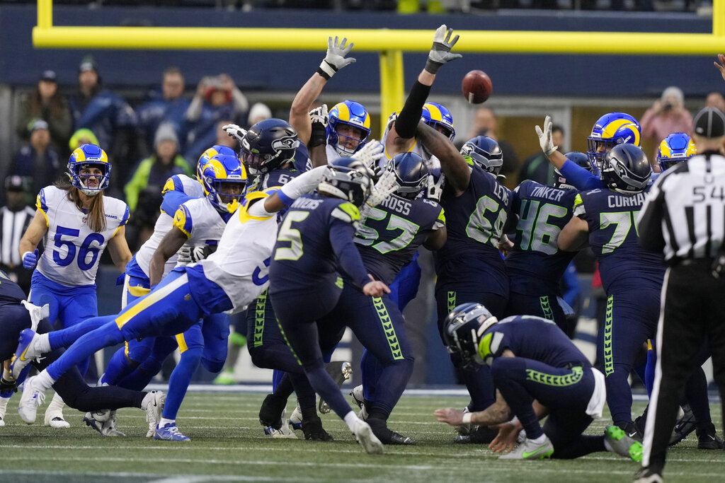 Seattle Seahawks place kicker Jason Myers (5) misses a potential game-winning field goal as time expired during fourth quarter of an NFL football game against the Los Angeles Rams Sunday, Jan. 8, 2023, in Seattle. (AP Photo/Stephen Brashear)