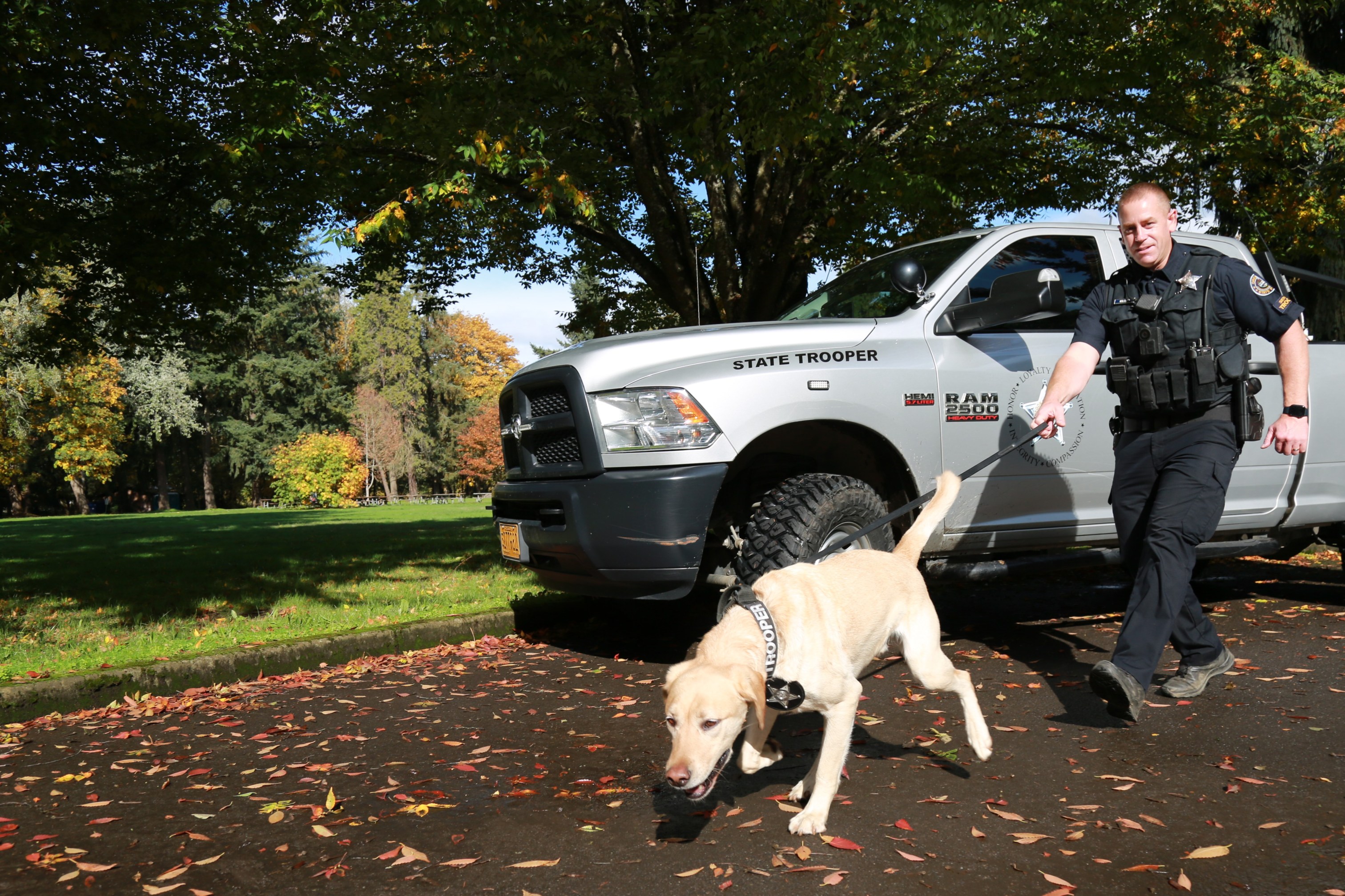 Senior Trooper Josh Wolcott with K-9 Buck - photo courtesy Oregon State Police