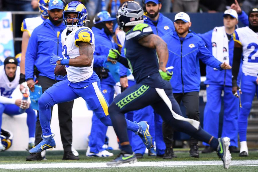 Cam Akers #3 of the Los Angeles Rams runs the ball during the first quarter against the Seattle Seahawks at Lumen Field on January 08, 2023 in Seattle, Washington. (Photo by Jane Gershovich/Getty Images)