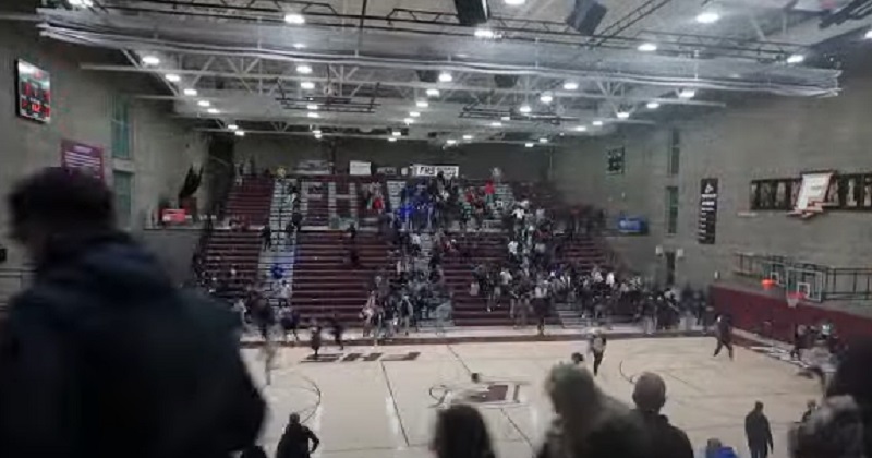 Fans begin to rush from the stands after shots were fired in the parking lot at Franklin High School during a basketball game, January 7, 2023 (Courtesy: AM 1450 KBPS)