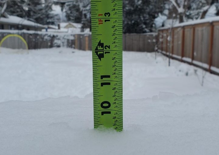 Beaverton resident measures about 9 inches of snow