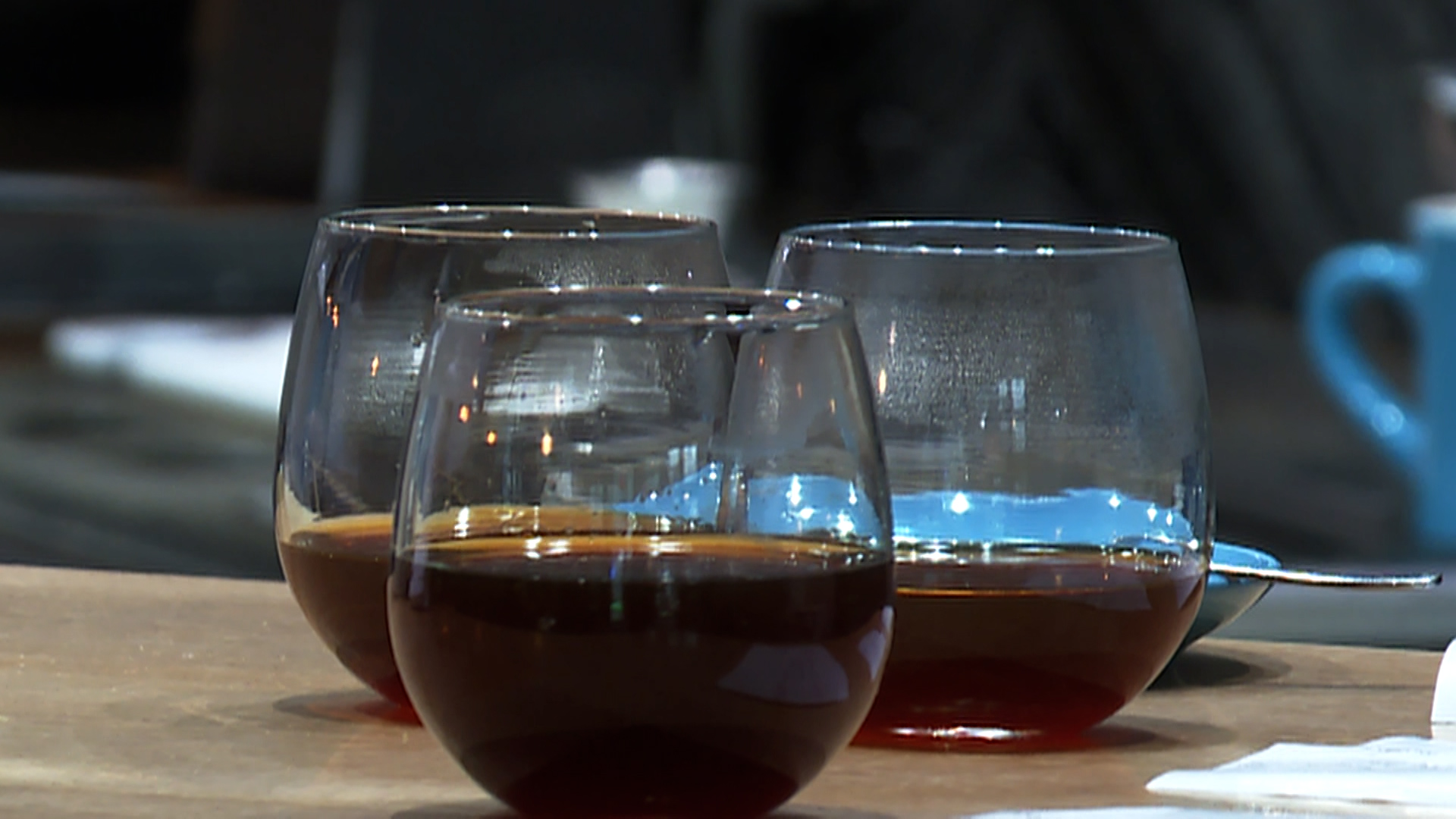 Cups of coffee wait to be served at Proud Mary Coffee Roasters in Portland. (KOIN)