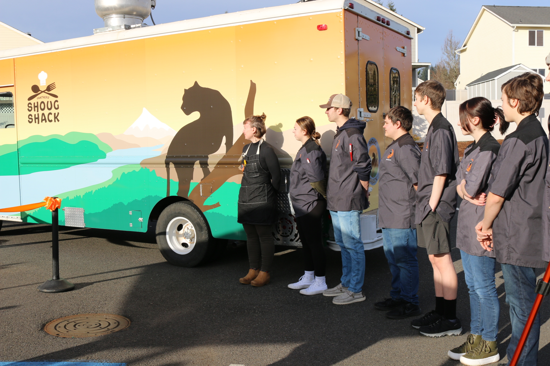 Washougal High School culinary arts students stand in front of their food cart, the Shoug Shack, that they opened on Feb. 2, 2023. Photo courtesy Washougal School District