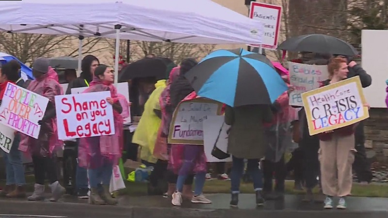 Protesters show their displeasure with Legacy Health after the Mt Hood Birthing Center was closed, February 13, 2023 (KOIN)