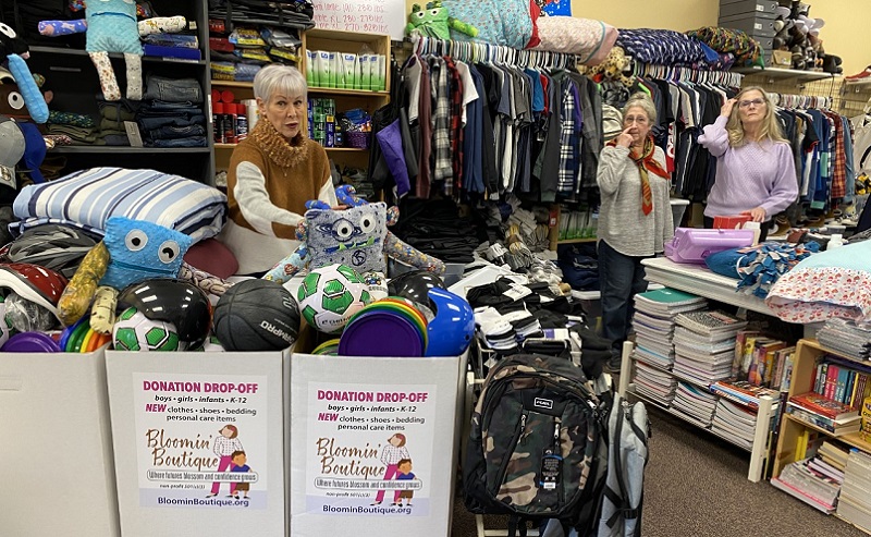 Patti Serres, left, inside The Bloomin' Boutique with volunteers Nan Dewitt and Barb Schmidt, January 2023 (KOIN)