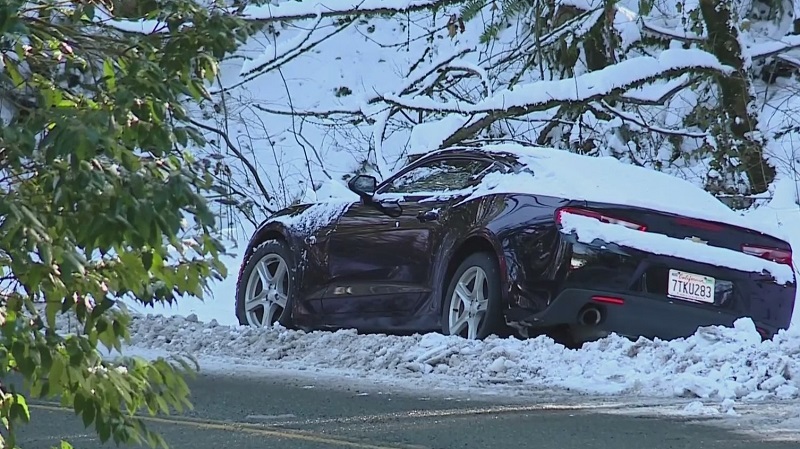 One of the many cars abandoned along Portland roads during a snowstorm, February 25, 2023 (KOIN)