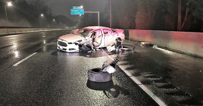 A wrong-way driver on I-5 slammed into this Ford Fusion on I-5 near South Corbett Avenue, February 4, 2023 (PPB)