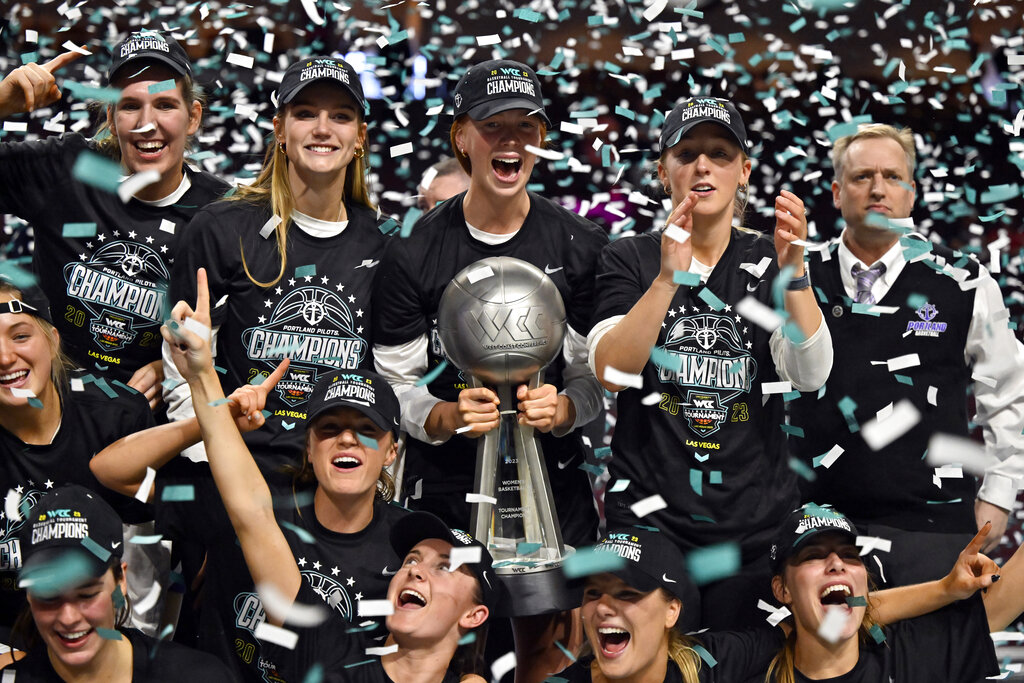 Portland celebrates after defeating Gonzaga in an NCAA college basketball game in the final of the West Coast Conference women's tournament Tuesday, March 7, 2023, in Las Vegas. (AP Photo/David Becker)