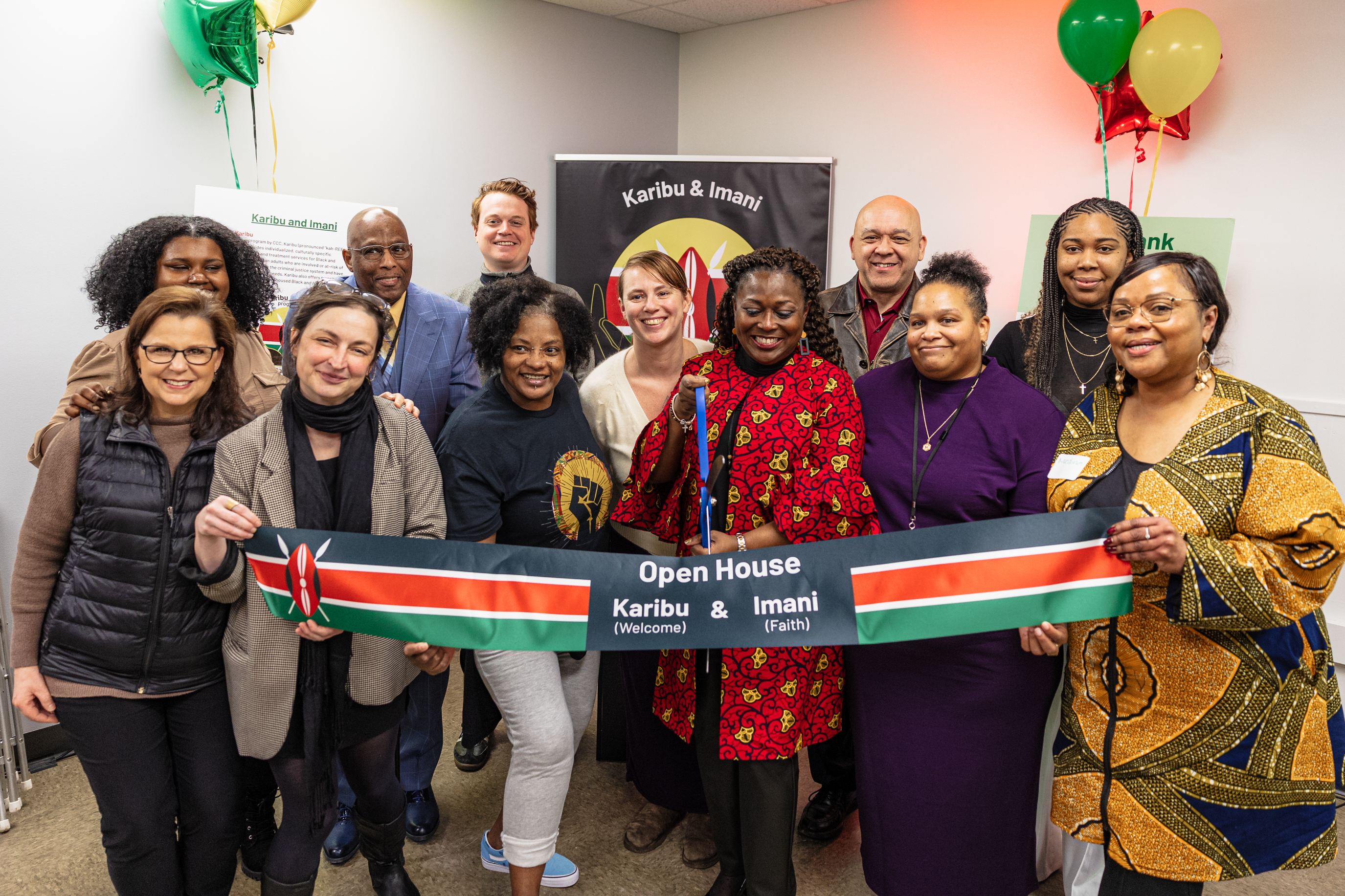 A group gathered at the new Karibu and Imani Center open house on Feb. 28, 2023 to celebrate the new facility opening. Photo courtesy CCC/Tom Cook