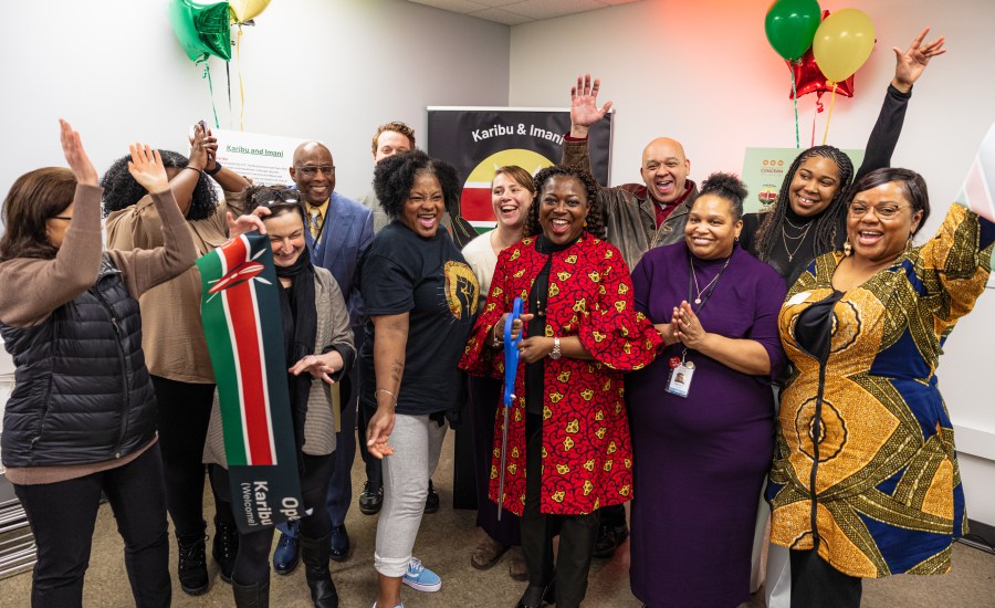 A group gathered at the new Karibu and Imani Center open house on Feb. 28, 2023 to celebrate the new facility opening. Photo courtesy CCC/Tom Cook