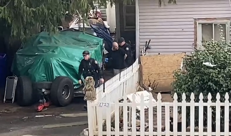 Darold Haws was arrested and handcuffed at the Hendon House in North Portland, March 19, 2023 (Erica Borman)