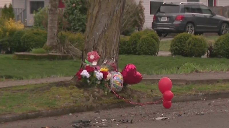 A makeshift memorial at the scene of a triple homicide on North Foss in Portland, March 27, 2023 (KOIN)