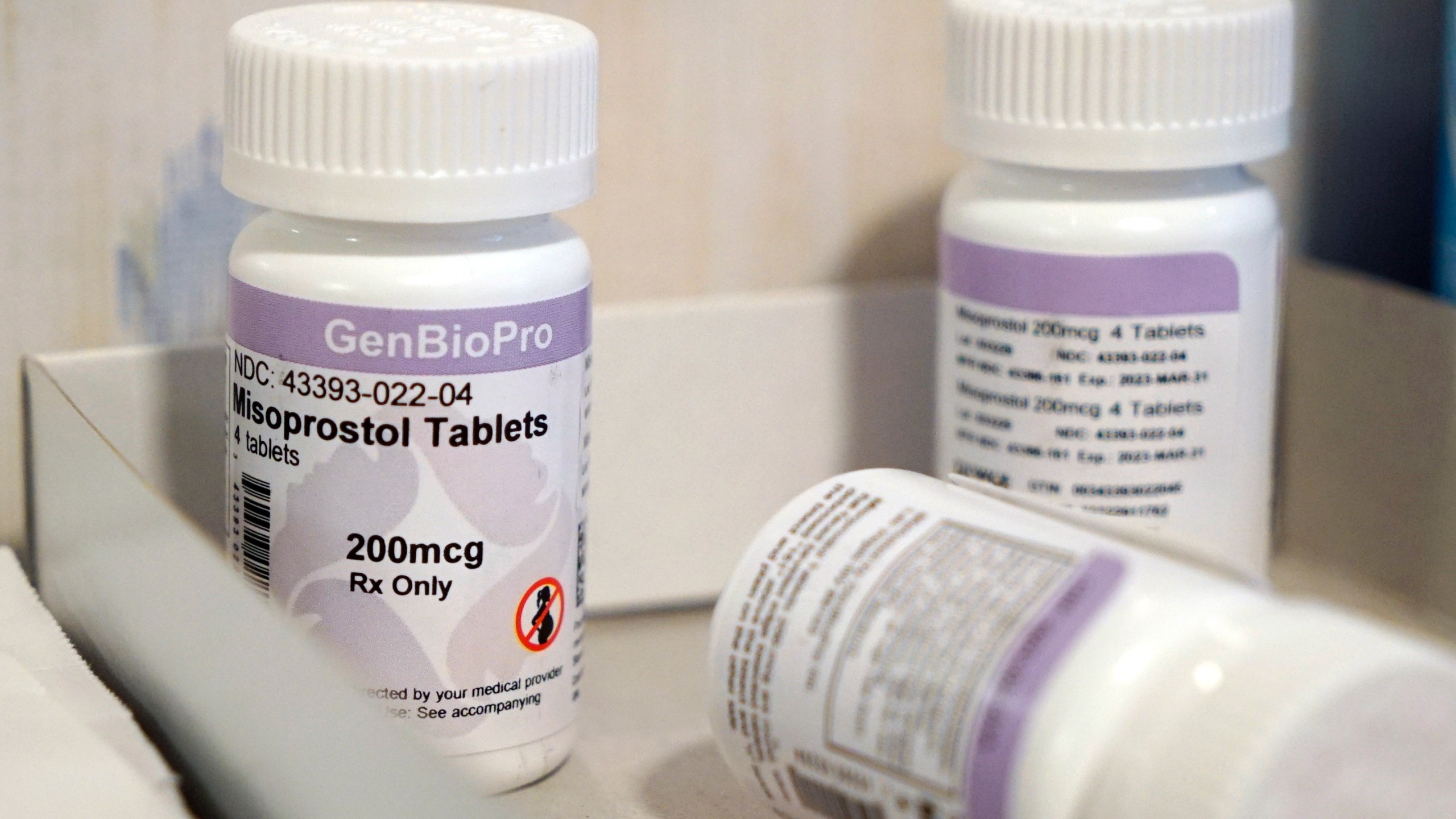 FILE - Bottles of the drug misoprostol sit on a table at the West Alabama Women's Center, March 15, 2022, in Tuscaloosa, Ala. Misoprostol induces uterus contractions that expel an embryo or fetus and other tissue. New York joined other Democratic-led states Tuesday, April 11, 2023, in stockpiling abortion pills in response to a court ruling in Texas that could limit access to the commonly used drug. (AP Photo/Allen G. Breed, File)