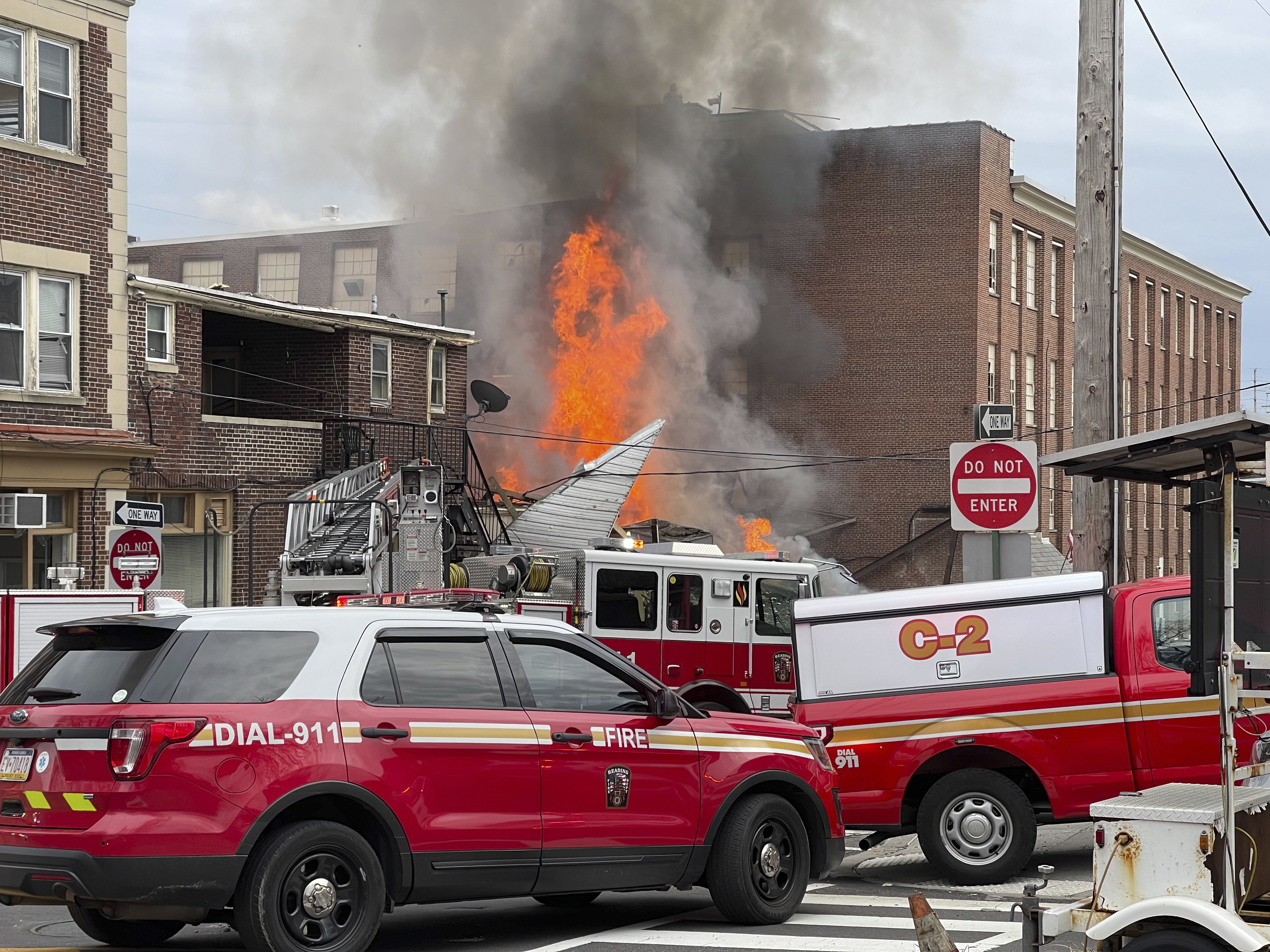 FILE - Emergency personnel work at the site of a deadly explosion at a chocolate factory in West Reading, Pa., March 25, 2023. According to a lawsuit filed Tuesday, April 11, a Pennsylvania candy-maker ignored warnings of a gas leak at its chocolate factory and bears responsibility for a subsequent explosion that killed seven workers. (Ben Hasty/Reading Eagle via AP, File)