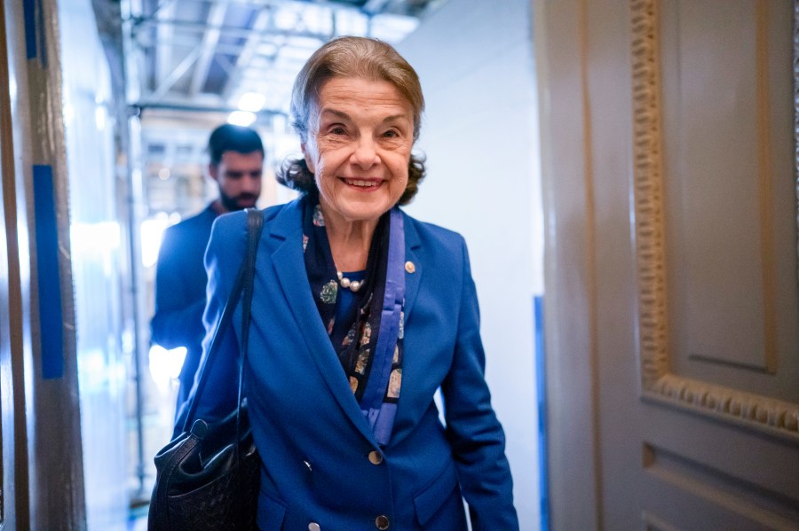 FILE - Sen. Dianne Feinstein, D-Calif., walks through a Senate corridor after telling her Democratic colleagues that she will not seek reelection in 2024, at the Capitol in Washington, Feb. 14, 2023. Feinstein's months-long absence from the Senate has become a growing problem for Democrats. Feinstein's vote is critical to confirm President Joe Biden's nominees to the federal courts, but Feinstein is away from the Senate indefinitely as she recovers from the shingles.(AP Photo/J. Scott Applewhite, File)