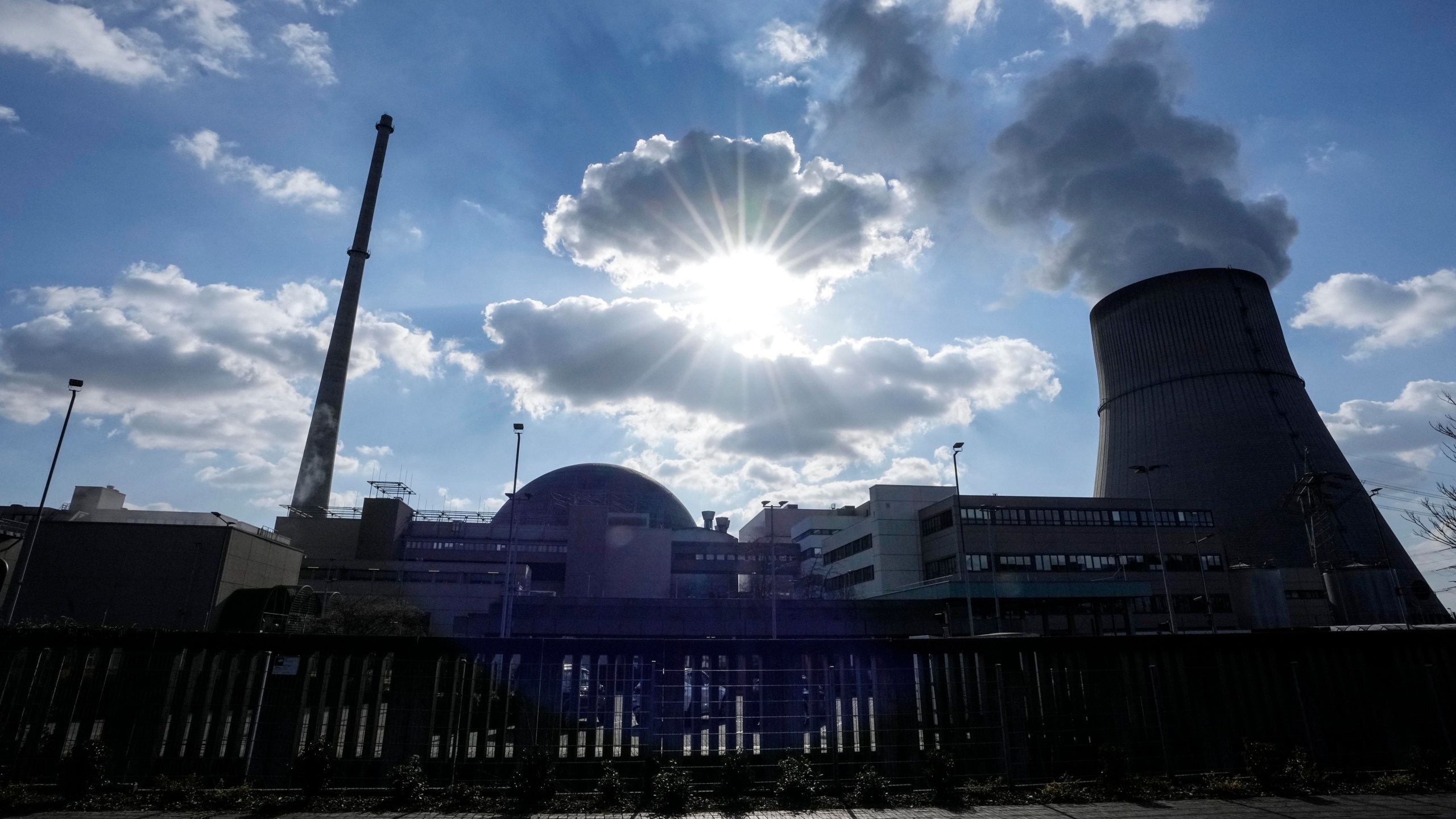 FILE - Water vapor rises from the RWE nuclear power plant Emsland in Lingen, western Germany, March 18, 2022. Germany is shutting down this nuclear power plant and two others on Saturday, April, 2023, as part of an energy transition agreed by successive governments. (AP Photo/Martin Meissner, File)