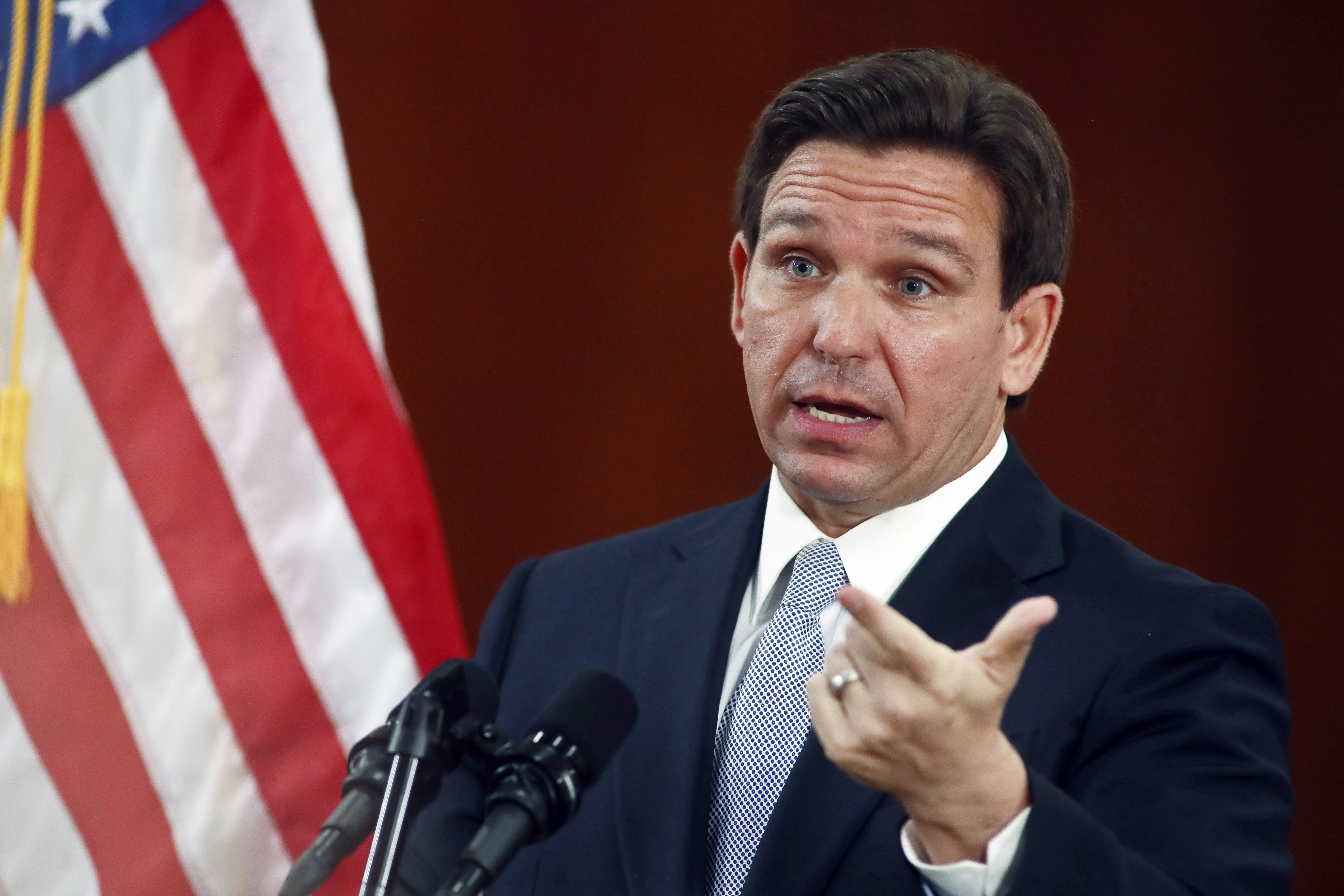 FILE - Florida Gov. Ron DeSantis answers questions from the media in the Florida Cabinet following his State of the State address during a joint session of the Senate and House of Representatives on March 7, 2023, at the state Capitol in Tallahassee, Fla. The Republican-dominated Florida Legislature on Thursday, April 13, approved a ban on abortions after six weeks of pregnancy, a proposal supported by DeSantis as he prepares for an expected presidential run. (AP Photo/Phil Sears, File)