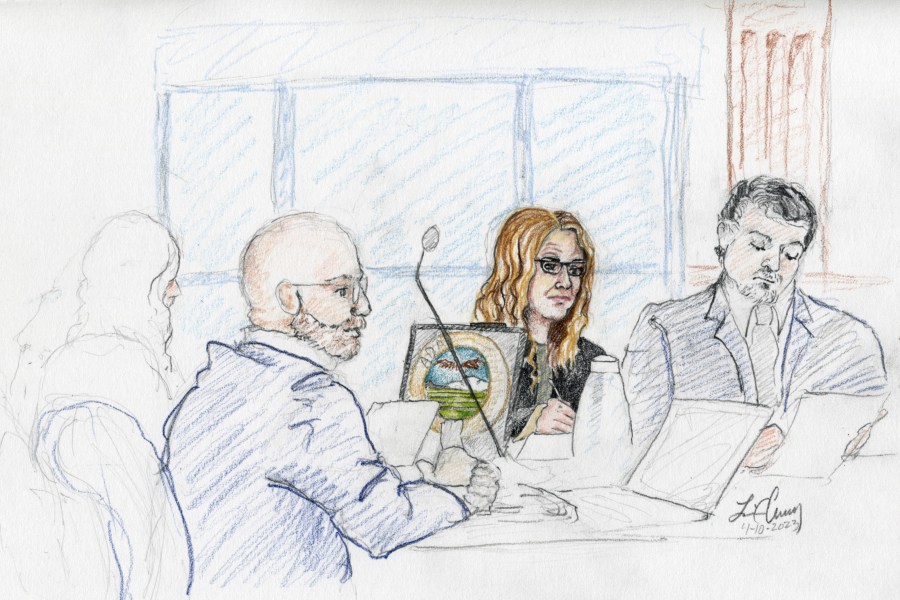 This courtroom sketch, from left, depicts Madison County prosecutor Rob Wood, Lori Vallow Daybell and defense attorney Jim Archibald during opening statements of Vallow Daybell's murder trial in Boise, Idaho, Monday, April 10, 2023. Prosecutors have charged Vallow Daybell and her husband, Chad Daybell, with multiple counts of conspiracy, murder and grand theft in connection with the deaths of Vallow Daybell's two children: Joshua "JJ" Vallow and Tylee Ryan. Both are also charged in connection with the death of Chad Daybell's previous wife, Tammy Daybell. (Lisa C. Cheney via AP)