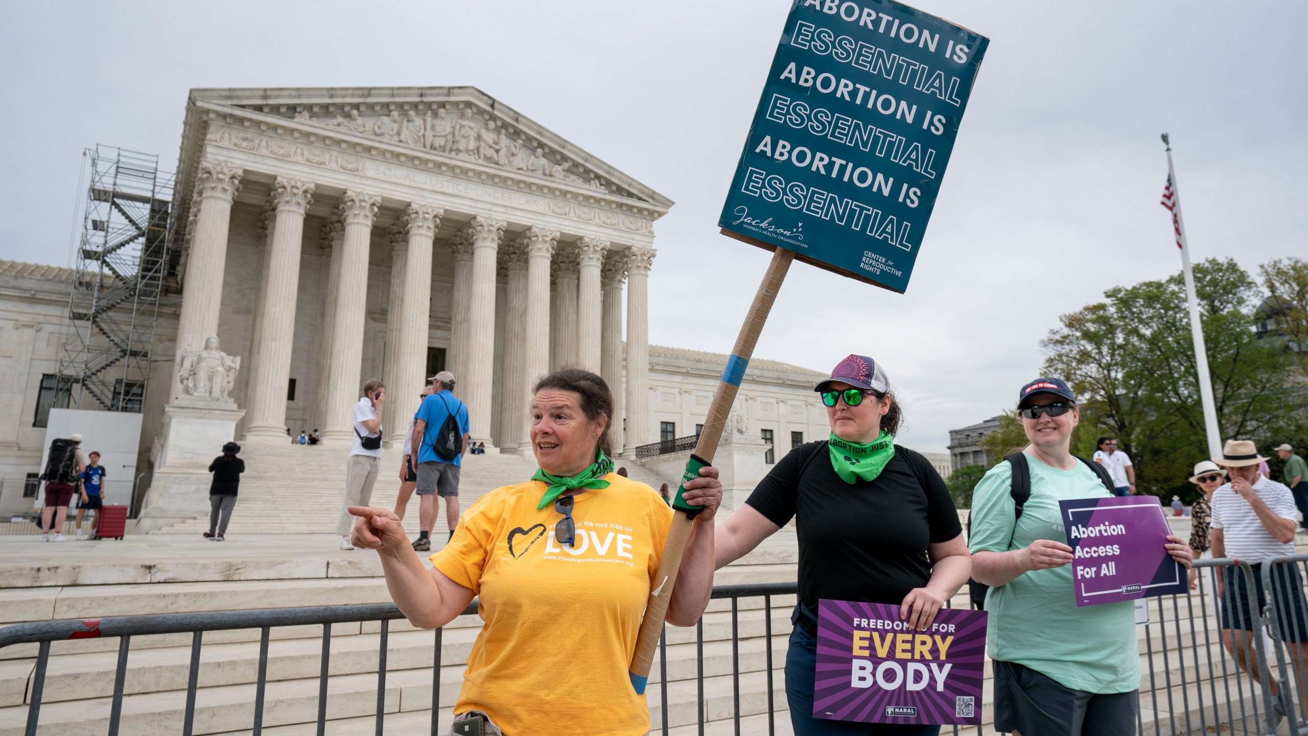 Doris Marlin, left, of Silver Spring, Md., and fellow activists demonstrate in front of the Supreme Court on Capitol Hill in Washington, Friday, April 14, 2023. The Supreme Court said Friday it was temporarily keeping in place federal rules for use of an abortion drug, while it takes time to more fully consider the issues raised in a court challenge. (AP Photo/J. Scott Applewhite)