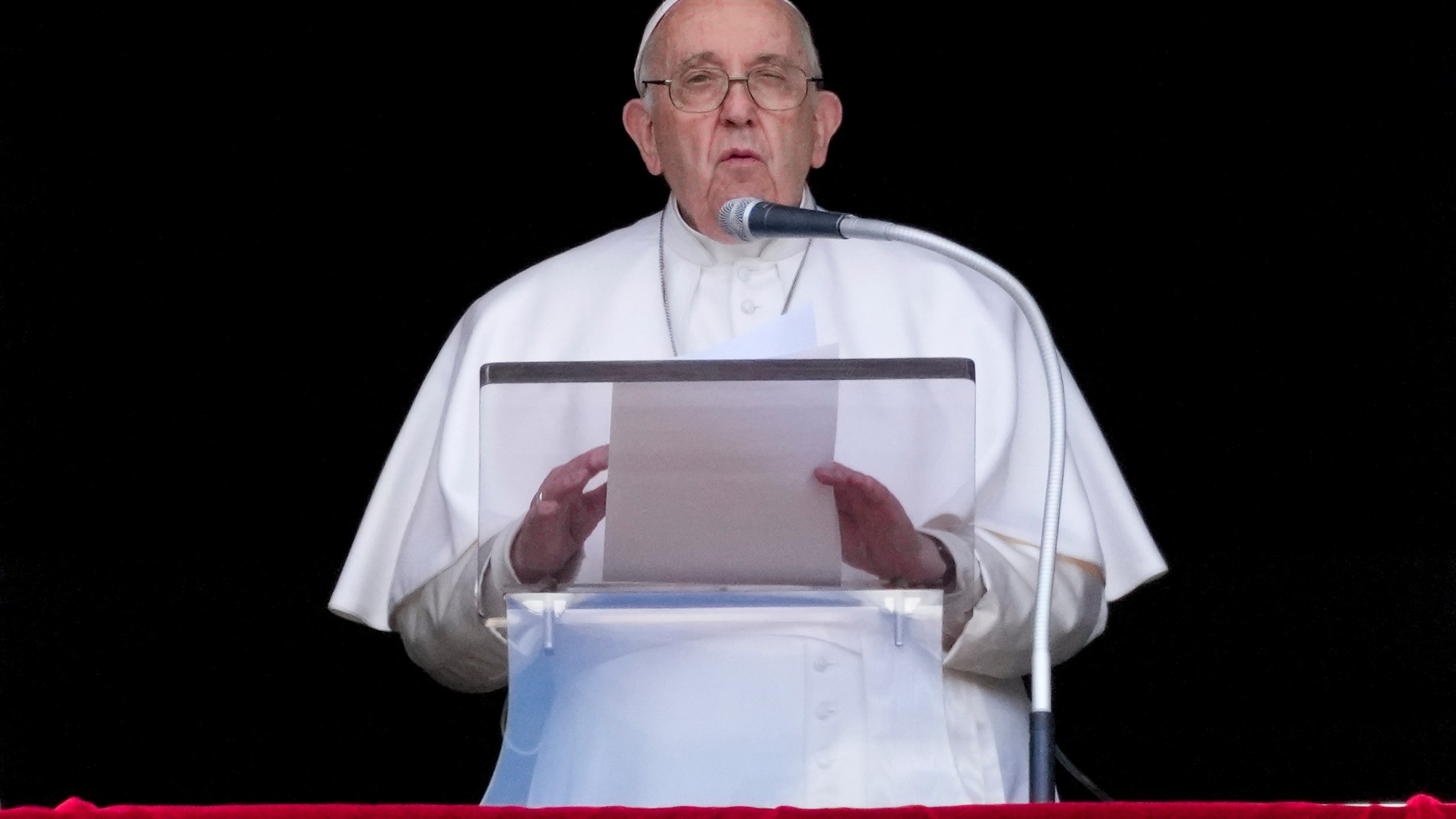 Pope Francis delivers his speech as he recites the Regina Coeli noon prayer from the window of his studio overlooking St.Peter's Square, at the Vatican, Sunday, April 16, 2023. (AP Photo/Andrew Medichini)