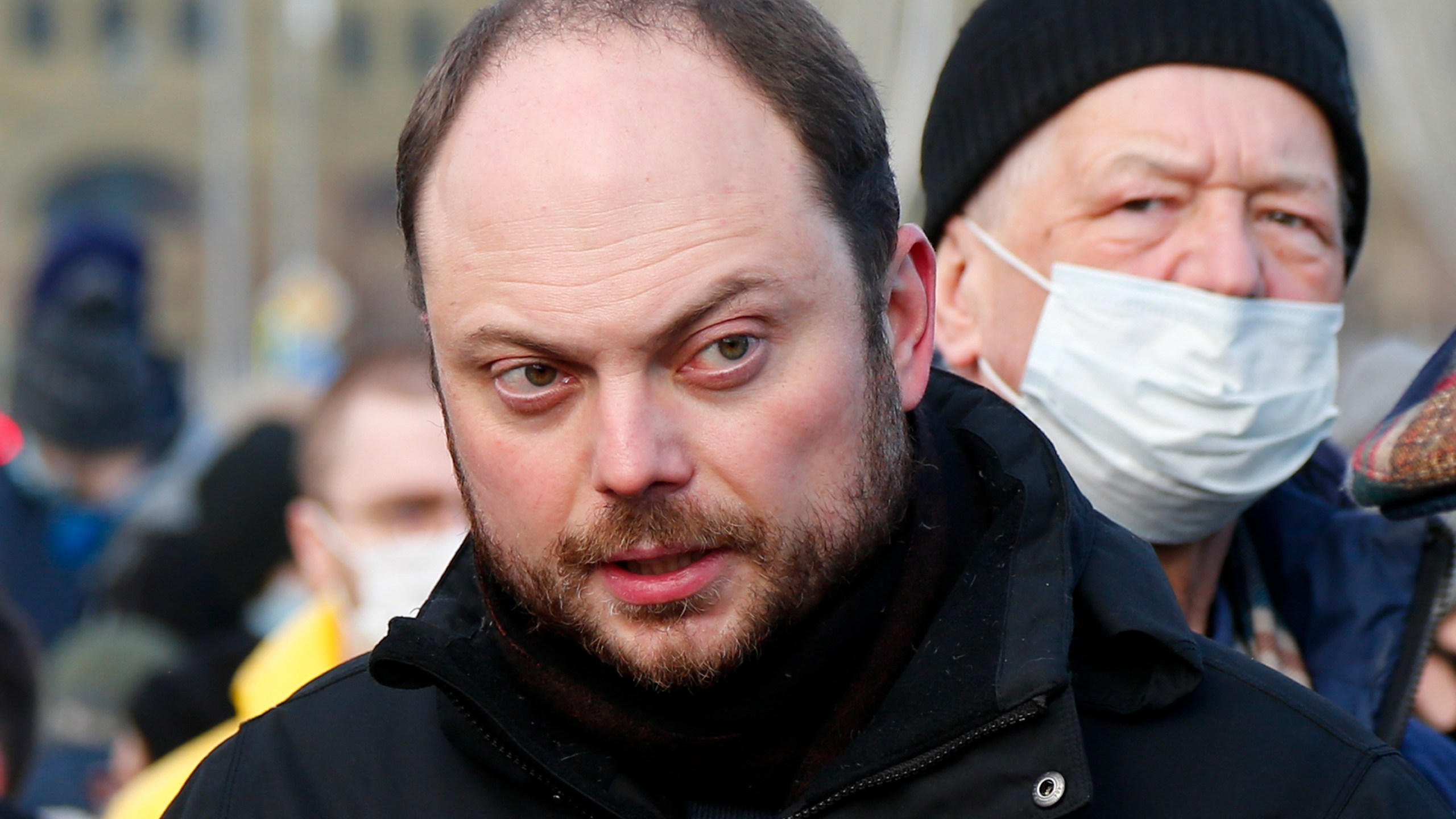 FILE - Vladimir Kara-Murza, Russian opposition activist arrives to lay flowers near the place where Russian opposition leader Boris Nemtsov was gunned down, in Moscow, Russia, on Feb. 27, 2021. The 25-year treason sentence imposed on prominent Russian opposition figure Vladimir Kara-Murza on Monday April 17, 2023 was a particularly severe show of authorities' intensifying intolerance of criticism of the war in Ukraine and other dissenting opinions. (AP Photo/Alexander Zemlianichenko, File)