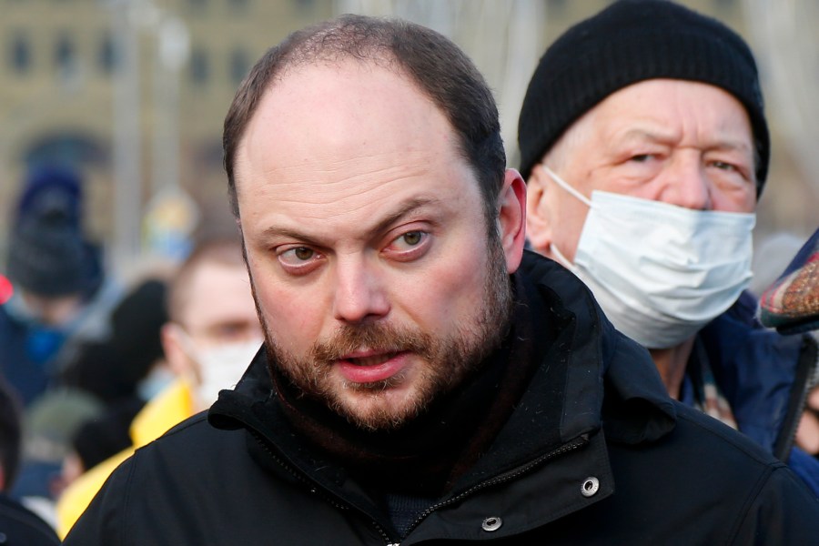 FILE - Vladimir Kara-Murza, Russian opposition activist arrives to lay flowers near the place where Russian opposition leader Boris Nemtsov was gunned down, in Moscow, Russia, on Feb. 27, 2021. The 25-year treason sentence imposed on prominent Russian opposition figure Vladimir Kara-Murza on Monday April 17, 2023 was a particularly severe show of authorities' intensifying intolerance of criticism of the war in Ukraine and other dissenting opinions. (AP Photo/Alexander Zemlianichenko, File)