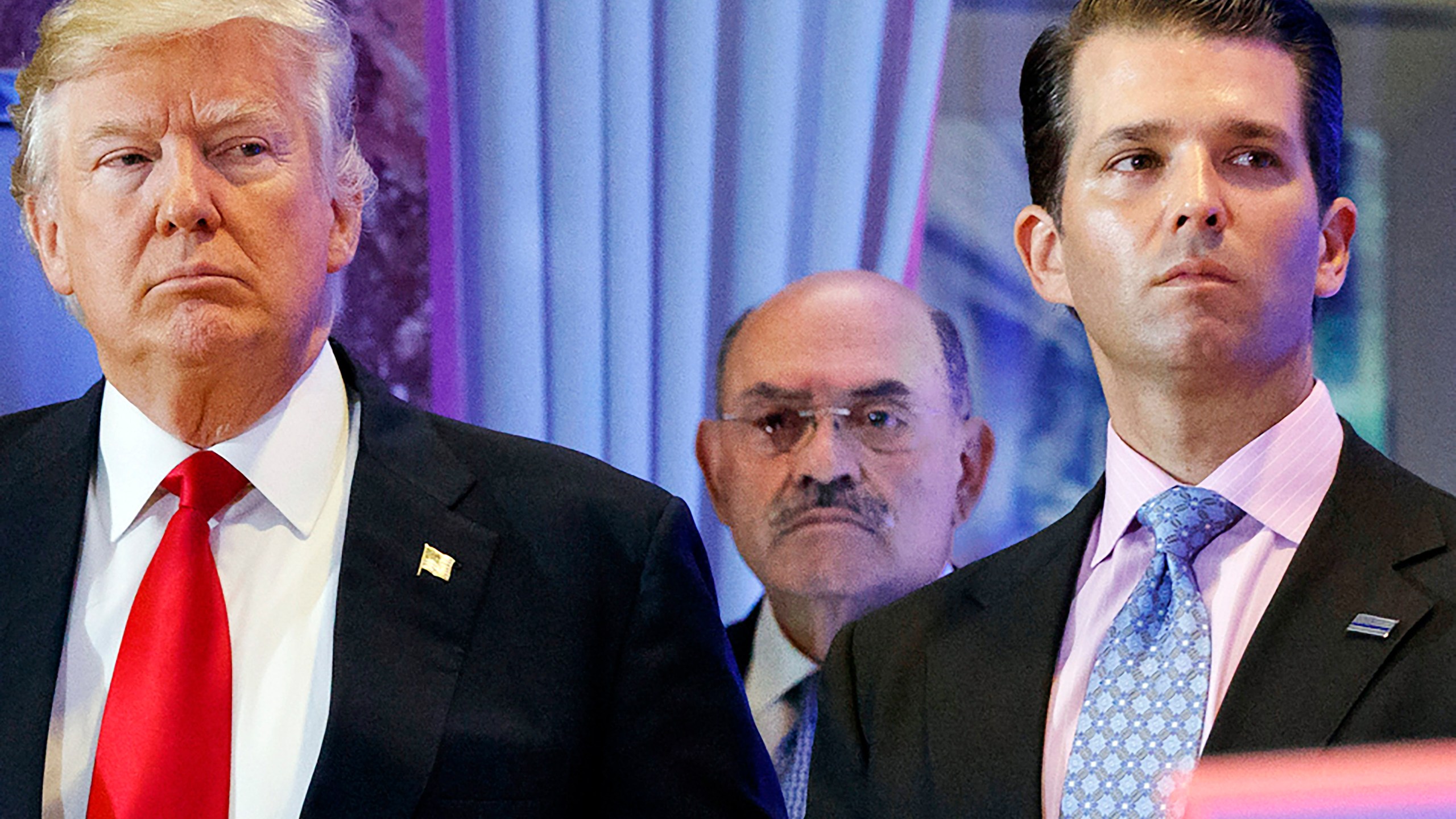 FILE - President-elect Donald Trump, left, his chief financial officer Allen Weisselberg, center, and his son Donald Trump Jr., right, attend a news conference at Trump Tower in New York, on Jan. 11, 2017. Weisselberg got out of jail Wednesday, April 19, 2023, but he might not have freed himself from the legal morass surrounding the former president. (AP Photo/Evan Vucci, File)