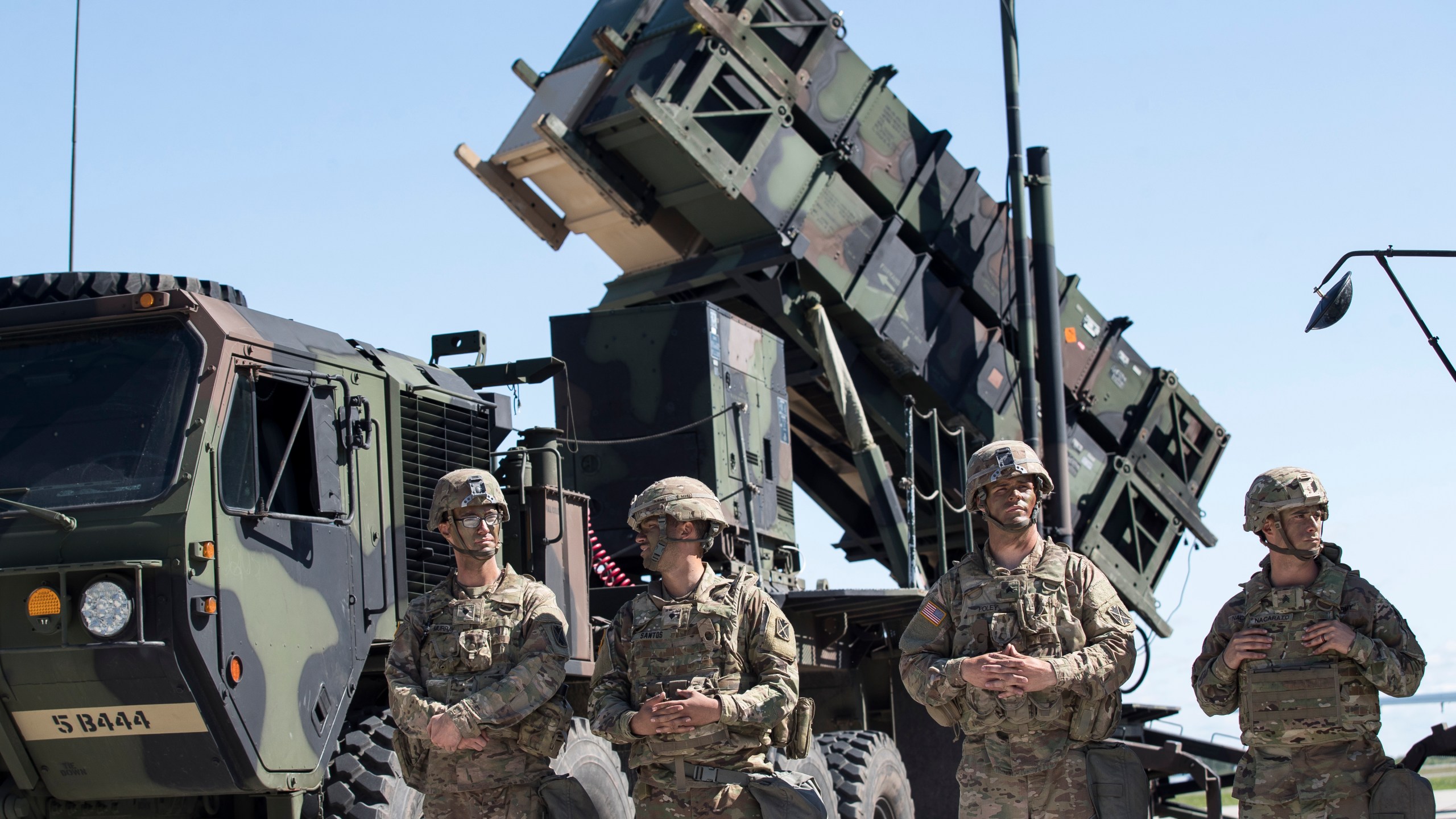 FILE - Members of US 10th Army Air and Missile Defense Command stands next to a Patriot surface-to-air missile battery during the NATO multinational ground based air defence units exercise "Tobruq Legacy 2017" at the Siauliai airbase some 230 km. (144 miles) east of the capital Vilnius, Lithuania, on July 20, 2017. Ukraine’s defense minister said Wednesday April 19, 2023 his country has received U.S-made Patriot surface-to-air guided missile systems it has long craved and which Kyiv hopes will help shield it from Russian strikes during the war. (AP Photo/Mindaugas Kulbis, File)