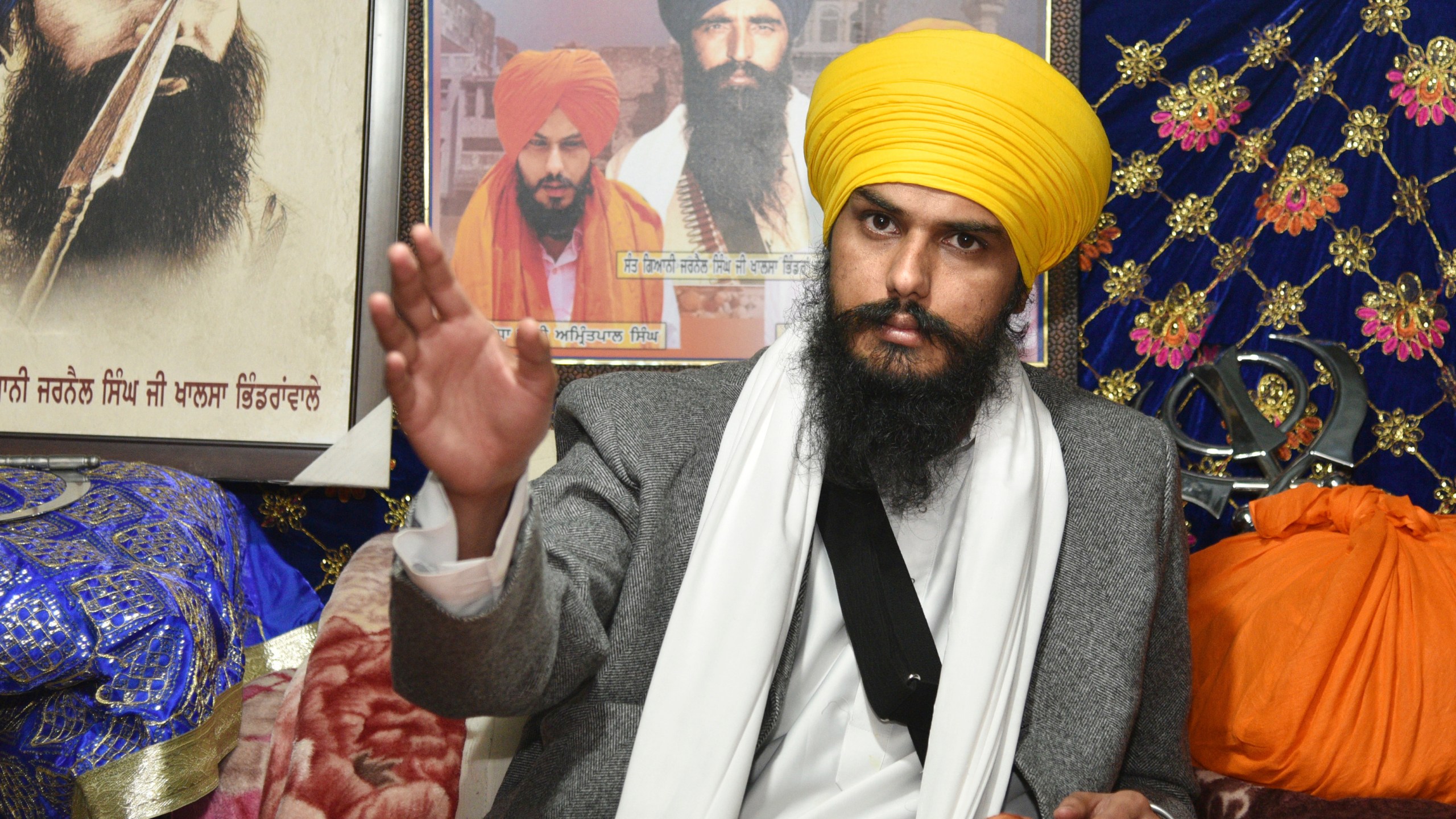 Sikh separatist leader and head of Waris Punjab De, or Punjab's Heirs, Amritpal Singh, talks to his supporters in the village Jallupur Khera, near Amritsar, India, Saturday, Jan.7, 2023. Indian police on Sunday April 23, arrested a Sikh separatist leader who has revived calls for secession of India's northern Punjab state bordering a hostile Pakistan, the police said. (AP Photo/Prabhjot Gill)