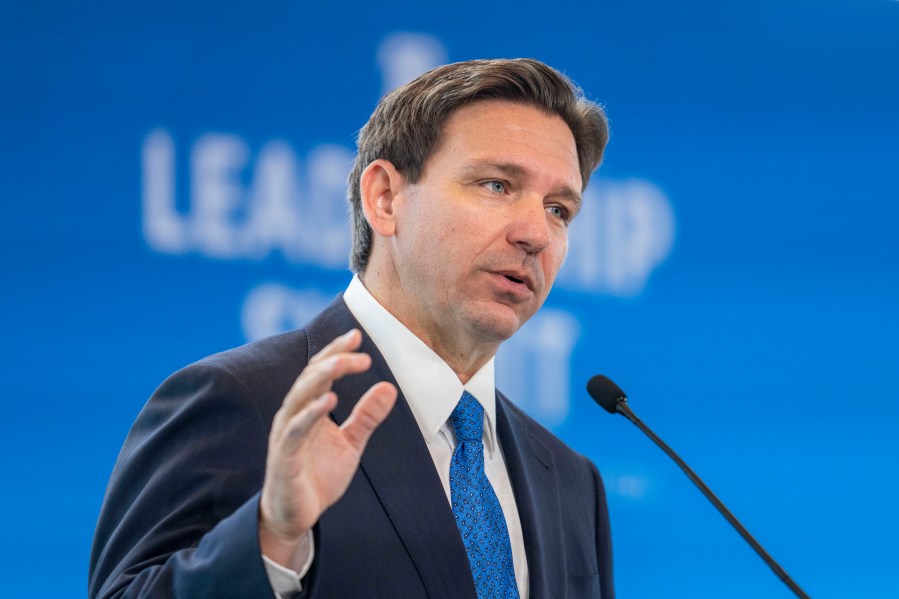 FILE - Florida Gov. Ron DeSantis speaks at the Heritage Foundation 50th Anniversary Celebration leadership summit, Friday, April 21, 2023, in Oxon Hill, Md. A new sense of urgency is growing among DeSantis’ allies as emboldened critics within his own party, especially President Donald Trump, work to undermine his presidential campaign before it begins. (AP Photo/Alex Brandon, File)