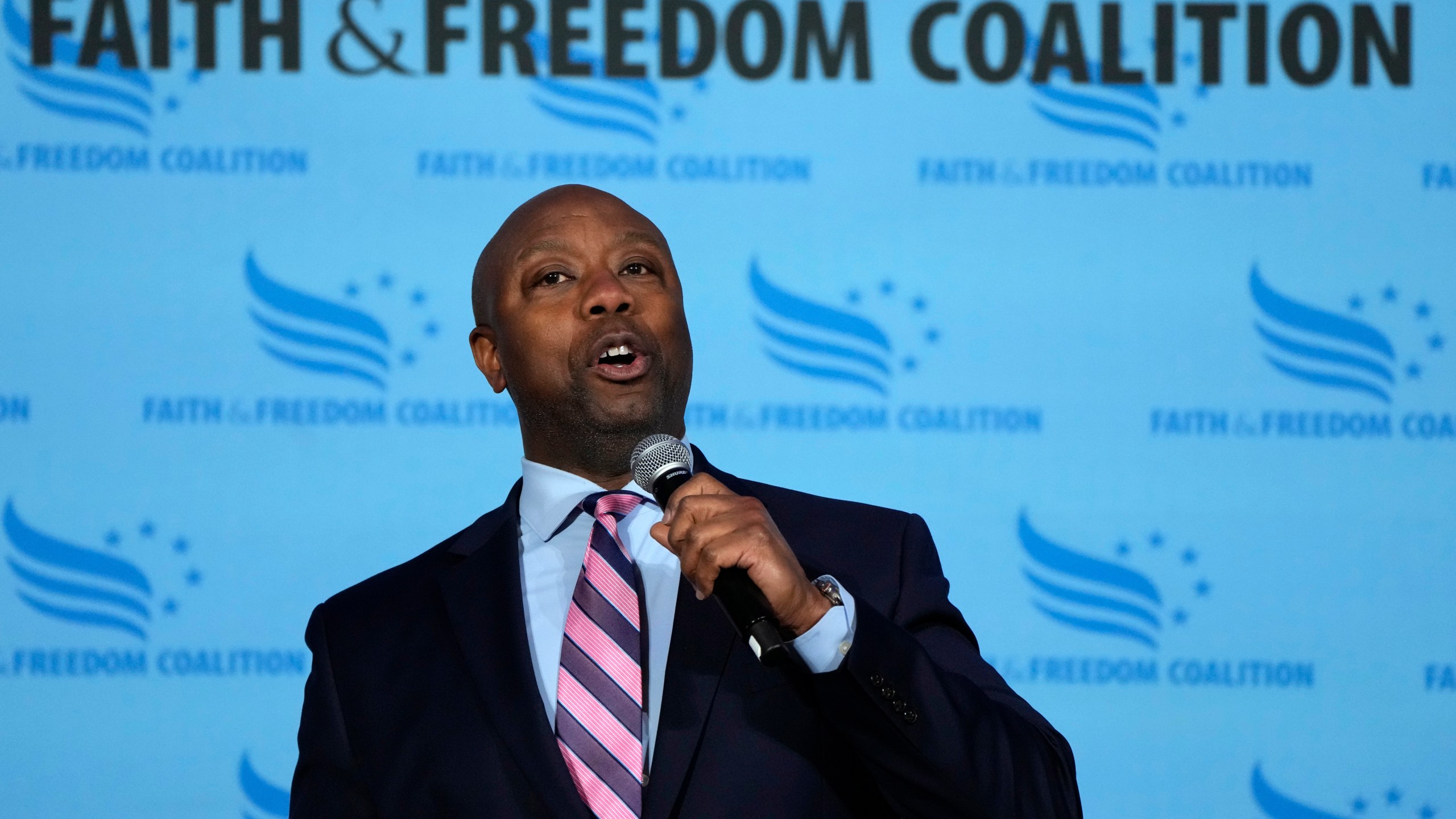 Sen. Tim Scott, R-S.C., speaks during the Iowa Faith and Freedom Coalition Spring Kick-Off Saturday, April 22, 2023, in Clive, Iowa. (AP Photo/Charlie Neibergall)