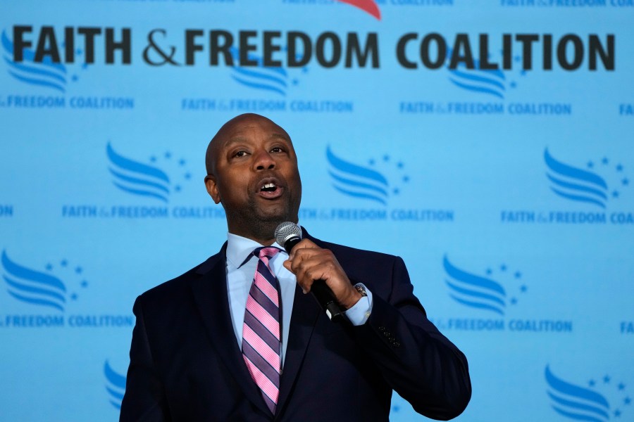 Sen. Tim Scott, R-S.C., speaks during the Iowa Faith and Freedom Coalition Spring Kick-Off Saturday, April 22, 2023, in Clive, Iowa. (AP Photo/Charlie Neibergall)