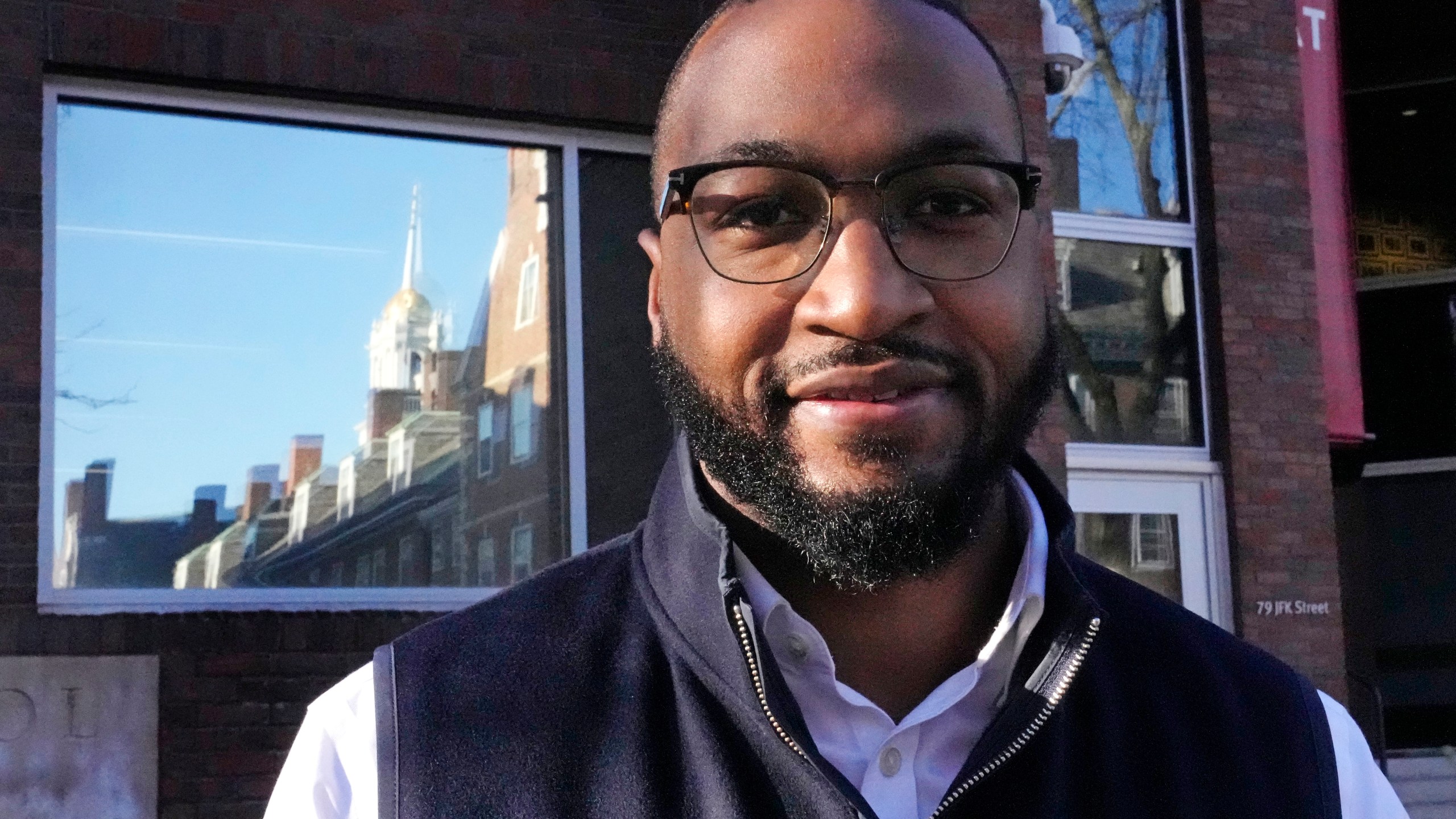 FILE - Quentin Fulks, who managed Sen. Raphael Warnock's re-election campaign in 2022, stands for a portrait outside the John F. Kennedy School of Government at Harvard University, Feb. 2, 2023, in Cambridge, Mass. Fulks, former top campaign aide for U.S. Sen. Raphael Warnock, has been named principal deputy campaign manager for President Joe Biden's 2024 reelection bid. (AP Photo/Charles Krupa, file)