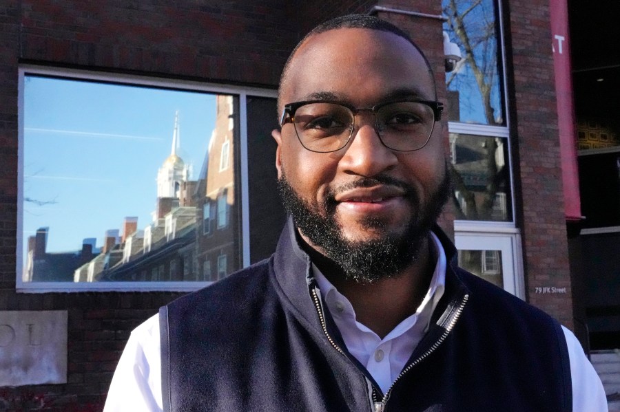 FILE - Quentin Fulks, who managed Sen. Raphael Warnock's re-election campaign in 2022, stands for a portrait outside the John F. Kennedy School of Government at Harvard University, Feb. 2, 2023, in Cambridge, Mass. Fulks, former top campaign aide for U.S. Sen. Raphael Warnock, has been named principal deputy campaign manager for President Joe Biden's 2024 reelection bid. (AP Photo/Charles Krupa, file)