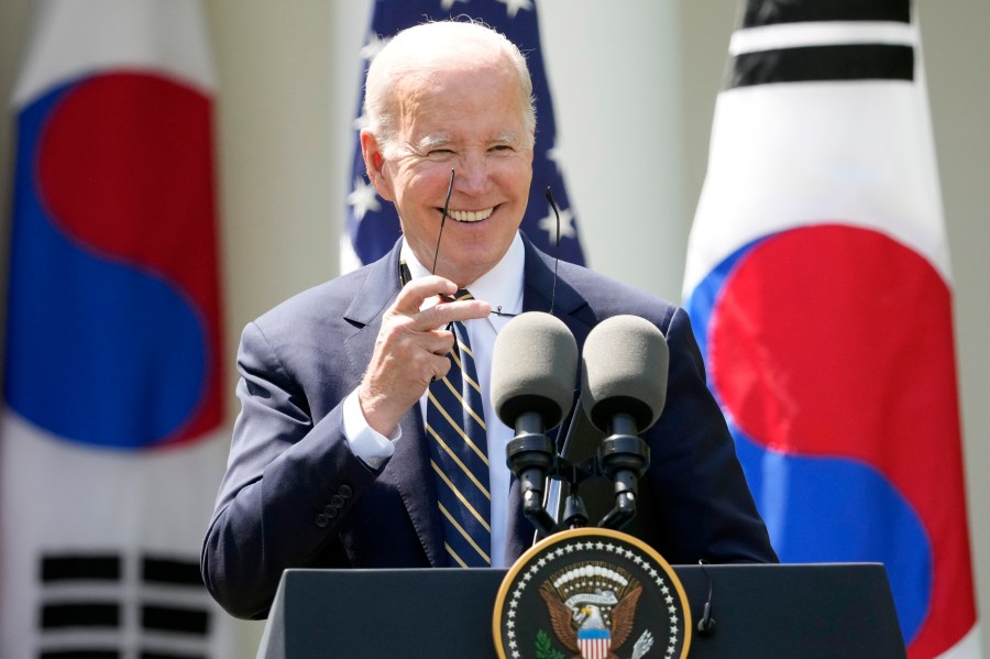 President Joe Biden takes his sunglasses off at a news conference with South Korea's President Yoon Suk Yeol in the Rose Garden of the White House Wednesday, April 26, 2023, in Washington. (AP Photo/Andrew Harnik)