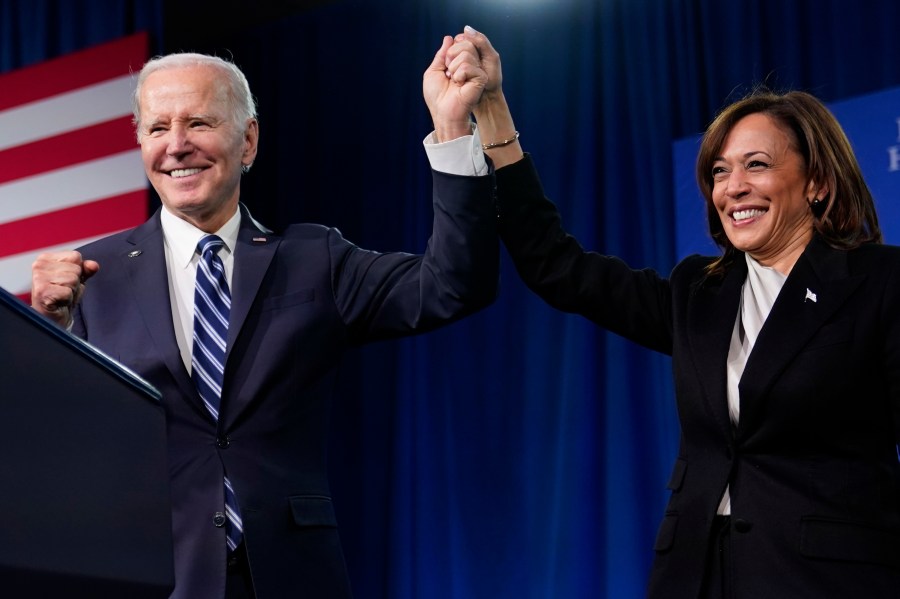 FILE - President Joe Biden and Vice President Kamala Harris stand on stage at the Democratic National Committee winter meeting, Feb. 3, 2023, in Philadelphia. Harris is poised to play a critical role in next year's election as President Joe Biden seeks a second term. (AP Photo/Patrick Semansky, File)