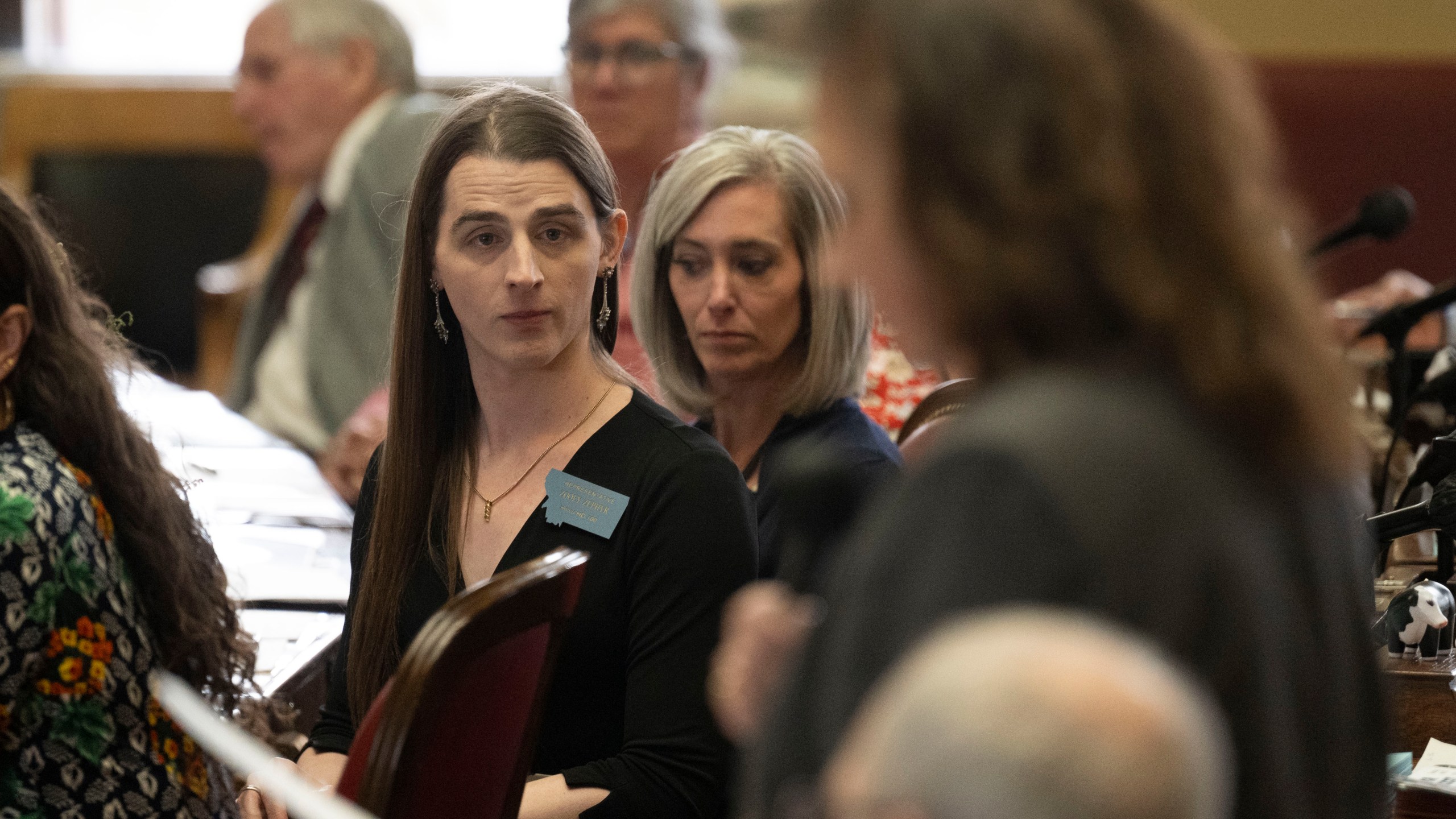 CORRECTS TO DISCIPLINE, NOT CENSURE - Rep. Zooey Zephyr looks on as Majority Leader Sue Vinton makes a motion discipline Rep. Zephyr during a session in the House of Representatives at the Montana State Capitol in Helena, Mont., on Wednesday, April 26, 2023. (AP Photo/Tommy Martino)