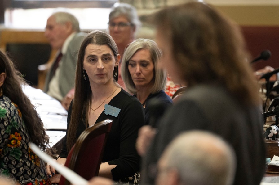 CORRECTS TO DISCIPLINE, NOT CENSURE - Rep. Zooey Zephyr looks on as Majority Leader Sue Vinton makes a motion discipline Rep. Zephyr during a session in the House of Representatives at the Montana State Capitol in Helena, Mont., on Wednesday, April 26, 2023. (AP Photo/Tommy Martino)