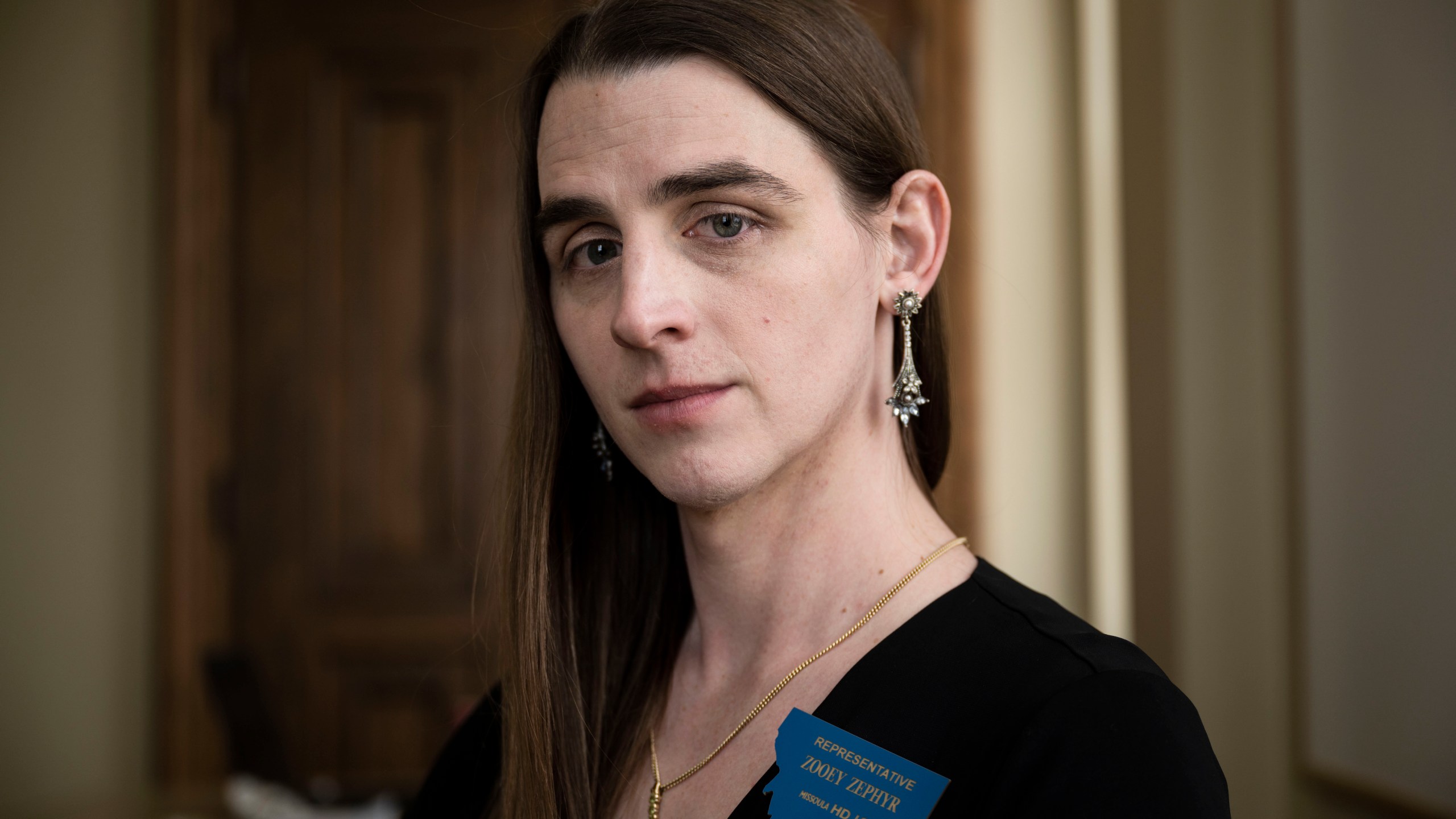 FILE - Rep. Zooey Zephyr poses for a photo at the Montana State Capitol in Helena, Mont., on April 26, 2023. The banishment of transgender lawmaker Zephyr from Montana's House floor has showcased the rising power of hardline conservatives who are leveraging divisive social issues to gain political influence. (AP Photo/Tommy Martino, File)