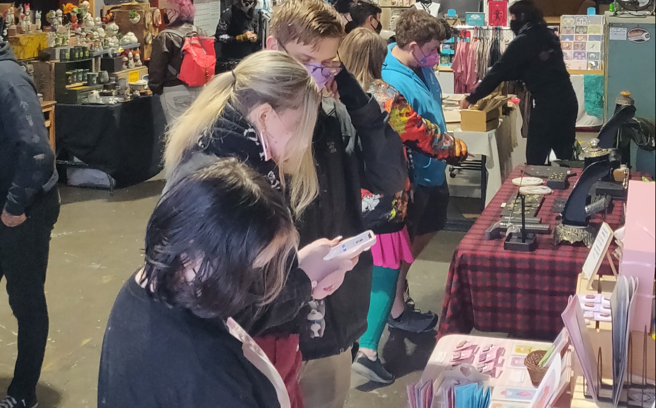 Shoppers peruse items at the Spectrum Art Market inside ADX. Photo courtesy Spectrum Art Market/JD Cox