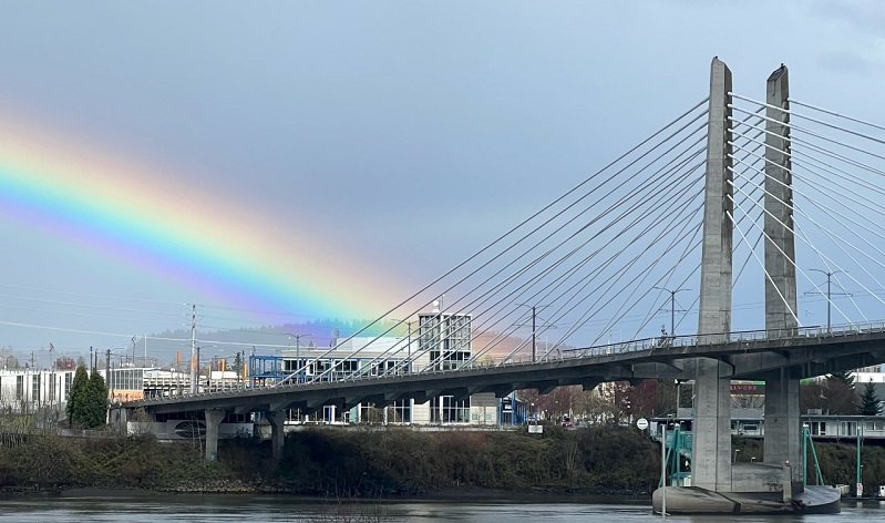 A rainbow appeared over the Tilikum Bridge in downtown Portland, April 7, 2023 (KOIN)