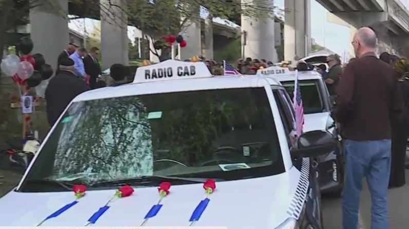 City leaders, police and taxi drivers paid tribute to cabbie Reese Lawhon, April 22, 2023 (KOIN)