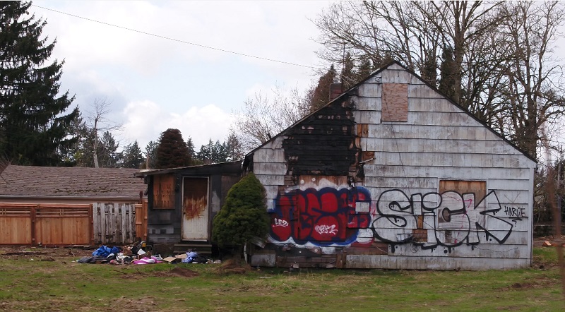 An abandoned house at SE 139th and East Burnside has been taken over by squatters in Portland, April 2023 (KOIN)