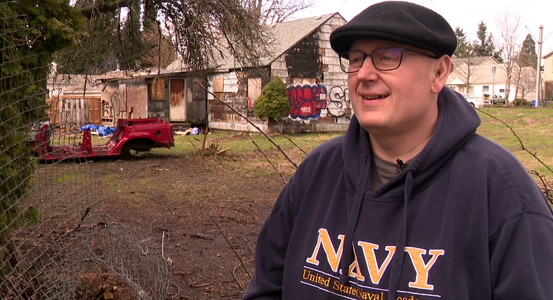 Jacob Adams lives next door to an abandoned house at SE 139th and East Burnside that has been taken over by squatters in Portland, April 2023 (KOIN)