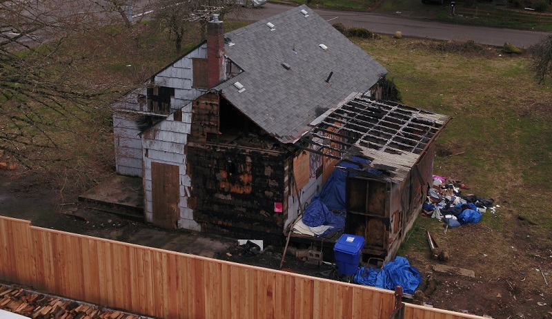 An abandoned house at SE 139th and East Burnside has been taken over by squatters in Portland, April 2023 (KOIN)