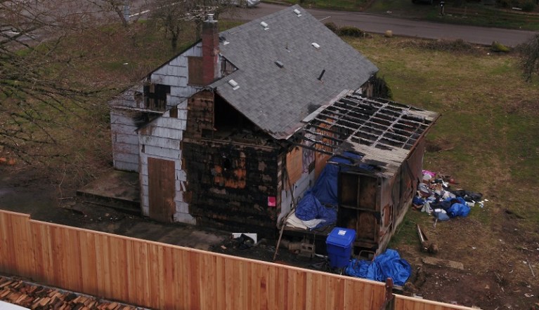 An abandoned house at SE 139th and East Burnside has been taken over by squatters in Portland, April 2023 (KOIN)