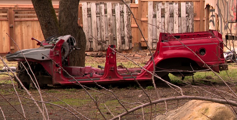 A trashed vehicle at a squatter house at SE 139th and East Burnside in Portland, April 2023 (KOIN)