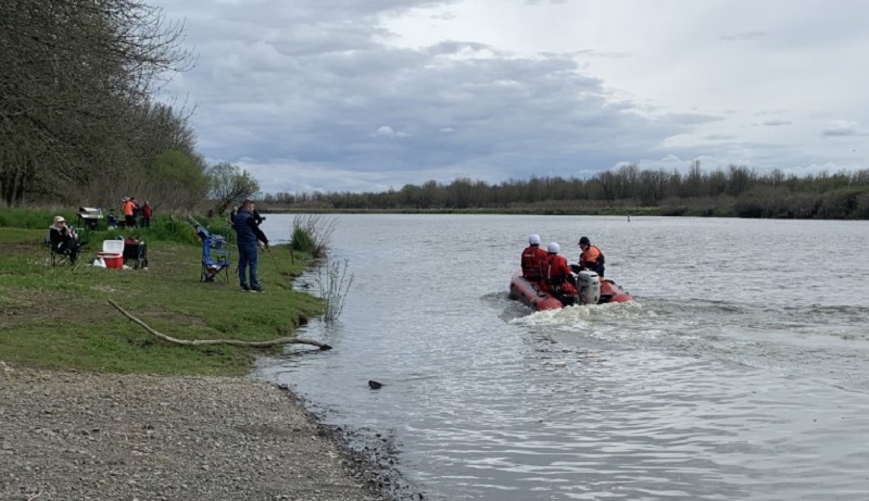 A father and his 2 teenage sons were rescued from Vancouver Lake after their aluminum rowboat capsized and sank, April 30, 2023 (Clark County Fire District 6)