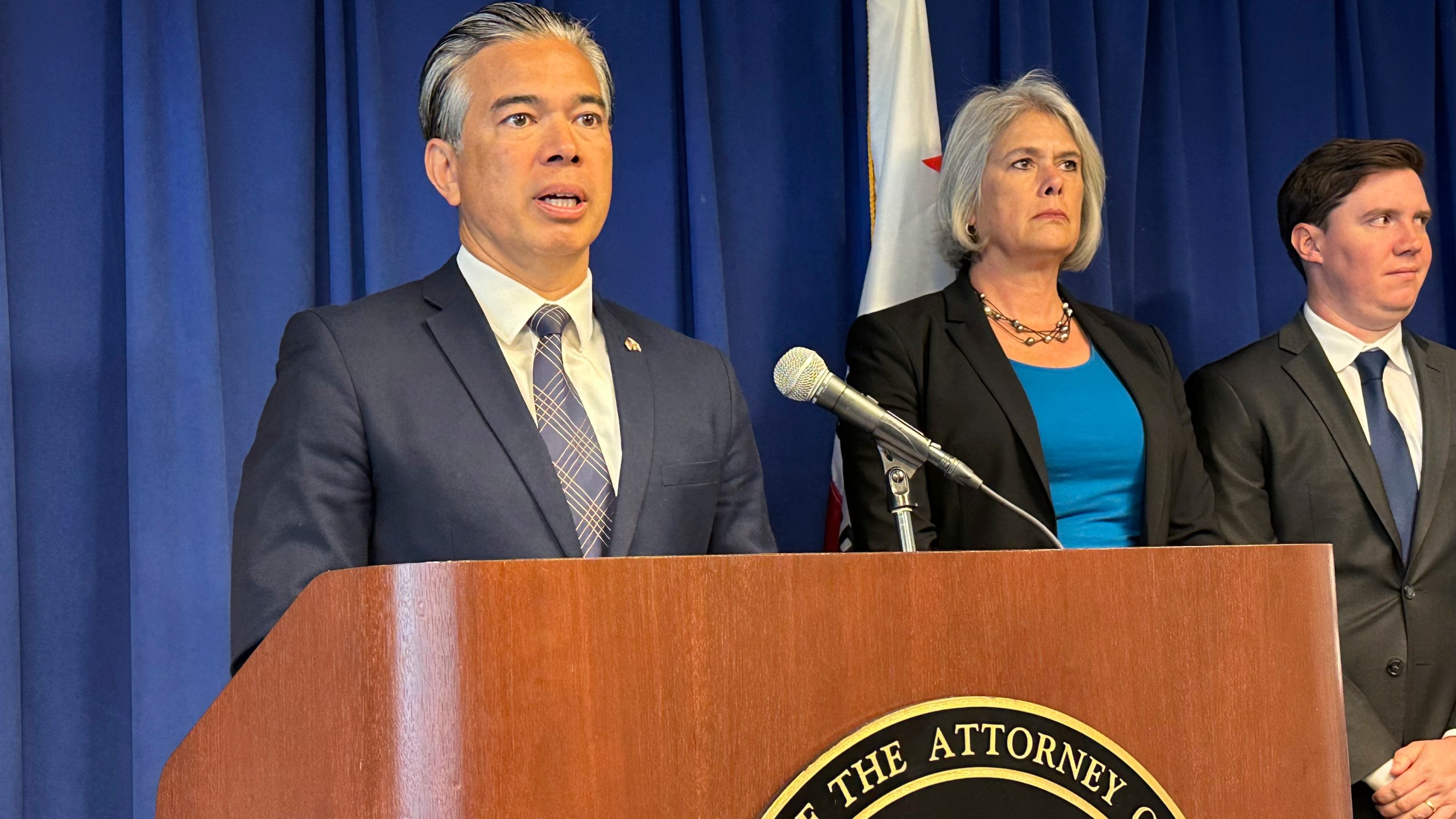 California Attorney General Rob Bonta, left, speaks during a news conference in Sacramento, Calif., on Monday, May 1, 2023. Bonta announced a lawsuit against the city of Elk Grove for not approving an apartment complex for people experiencing homelessness. (AP Photo/Adam Beam)