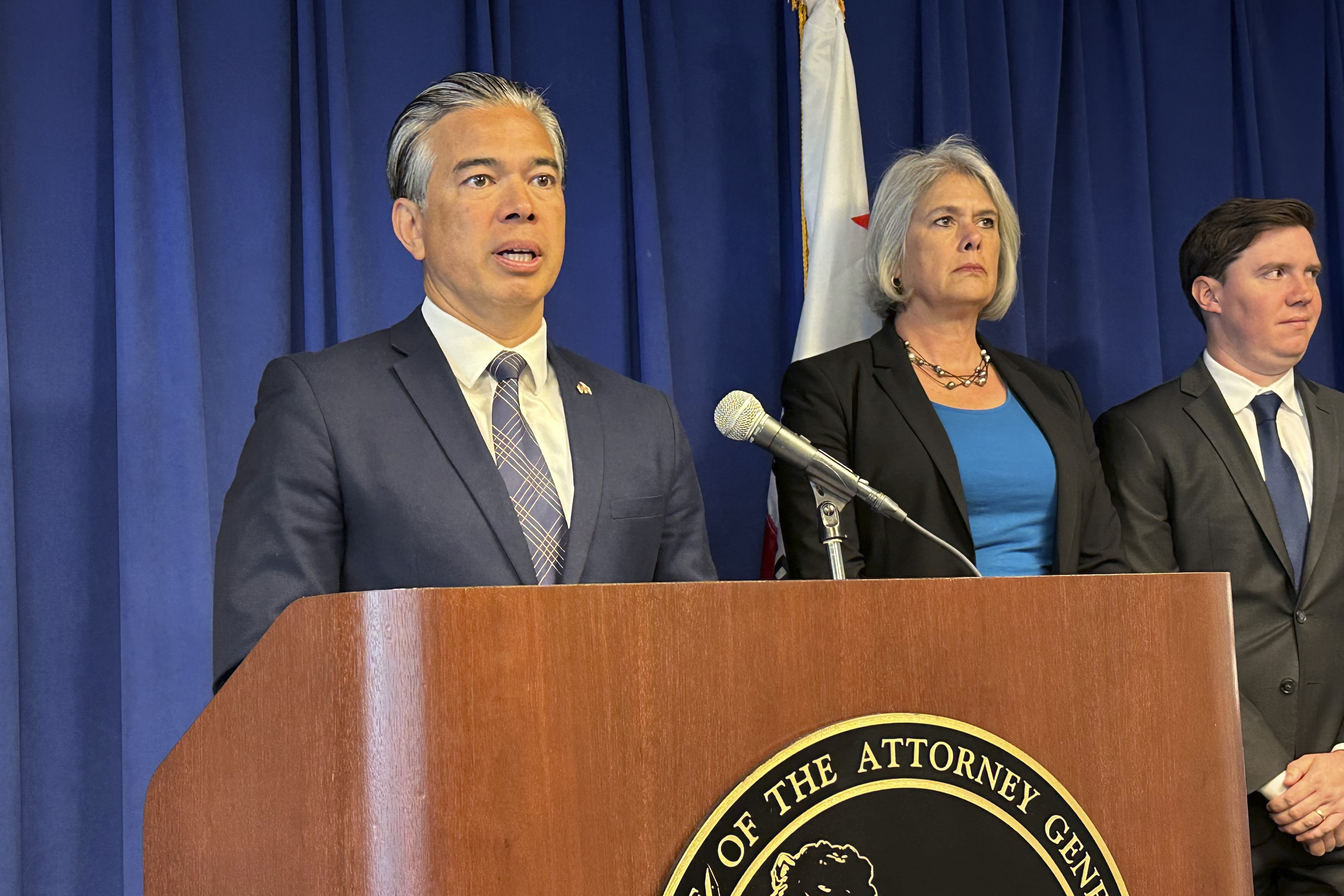 California Attorney General Rob Bonta, left, speaks during a news conference in Sacramento, Calif., on Monday, May 1, 2023. Bonta announced a lawsuit against the city of Elk Grove for not approving an apartment complex for people experiencing homelessness. (AP Photo/Adam Beam)